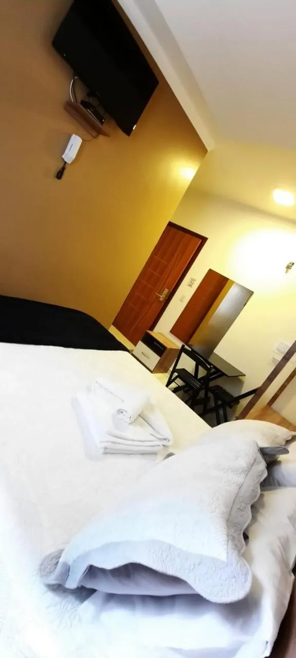 Bed in Pousada Araras