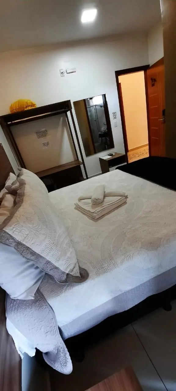 Bed in Pousada Araras