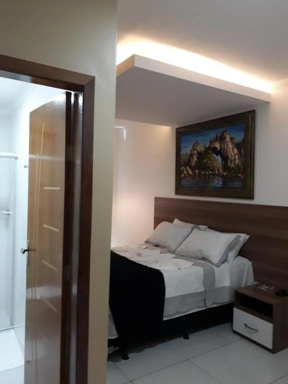 Bed in Pousada Araras