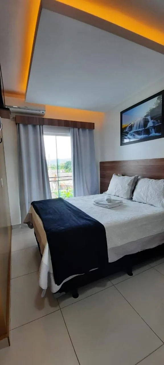 Bed in Pousada Araras
