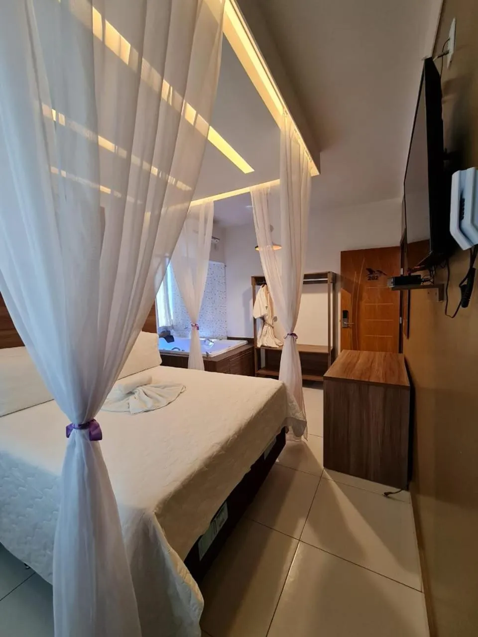 Bed in Pousada Araras