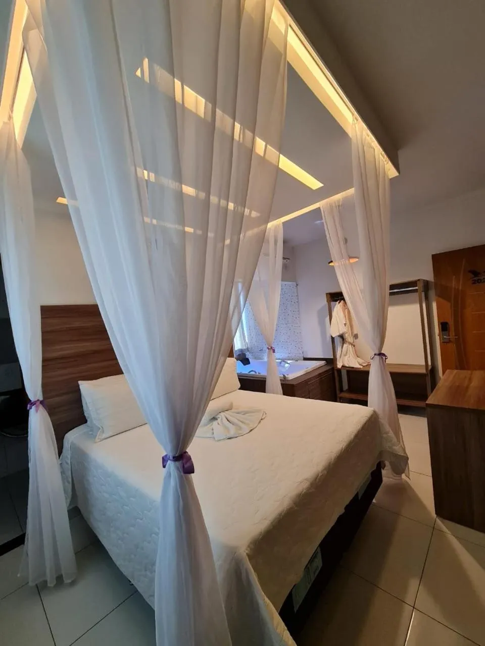 Bed in Pousada Araras