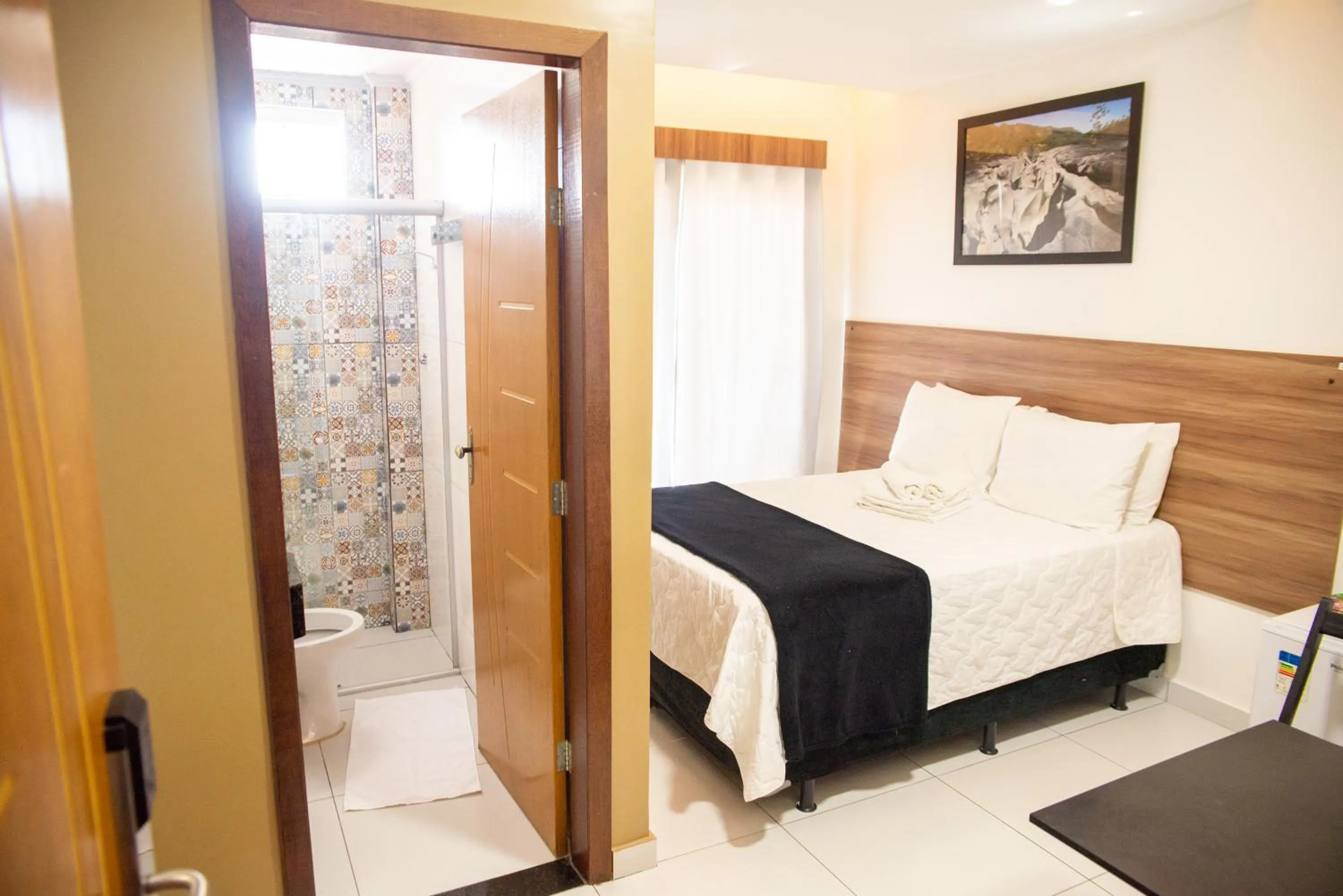Bed in Pousada Araras