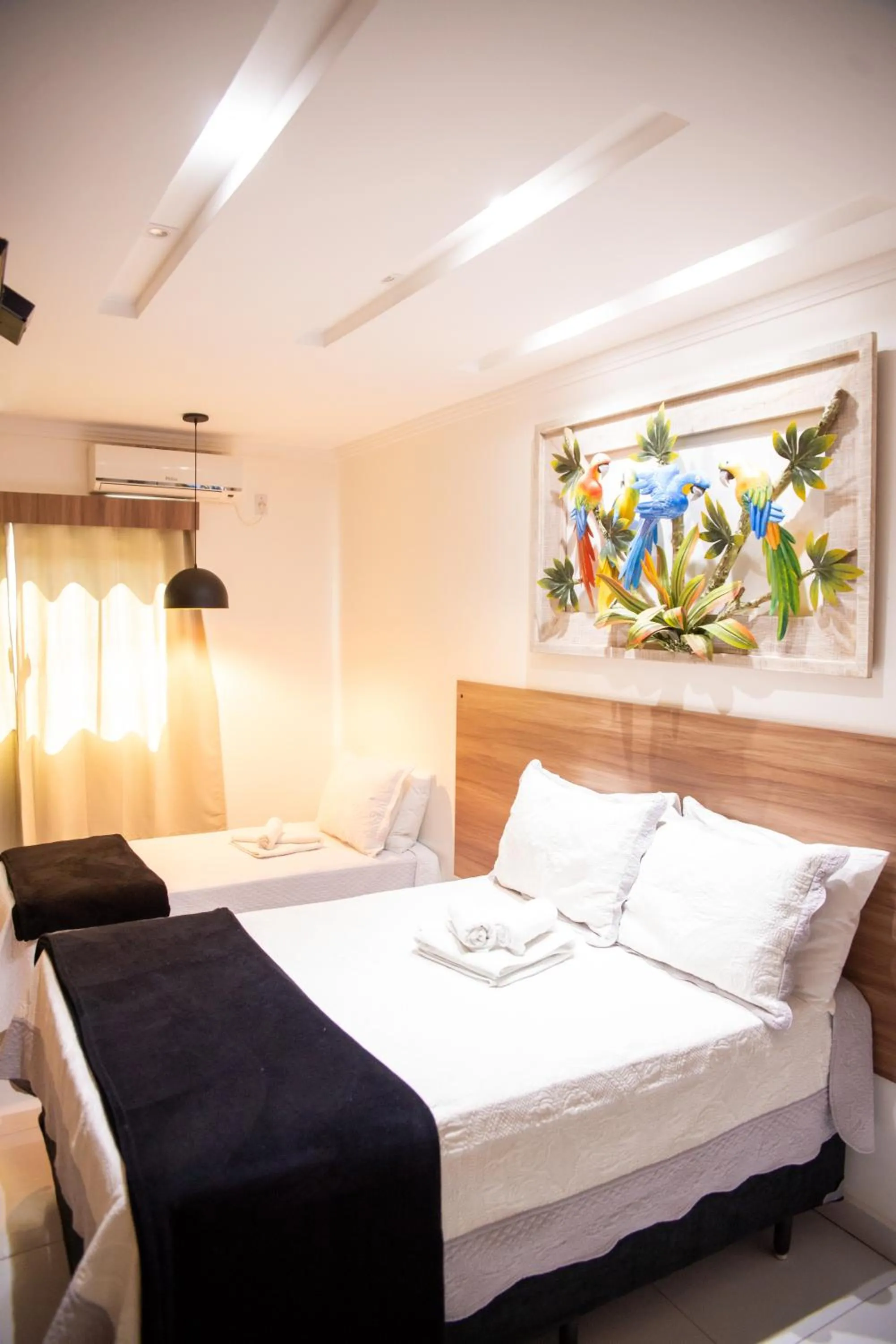 Bed in Pousada Araras