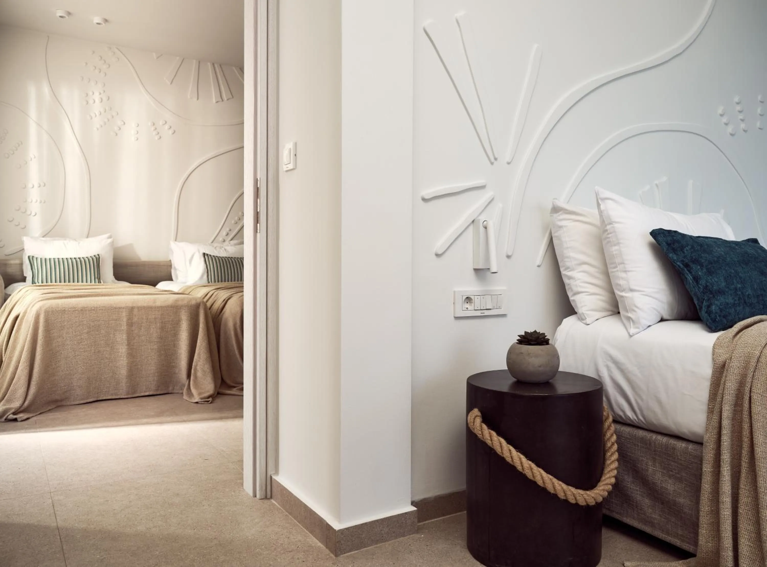 Seating area, Bed in Windmill Bay Hotel