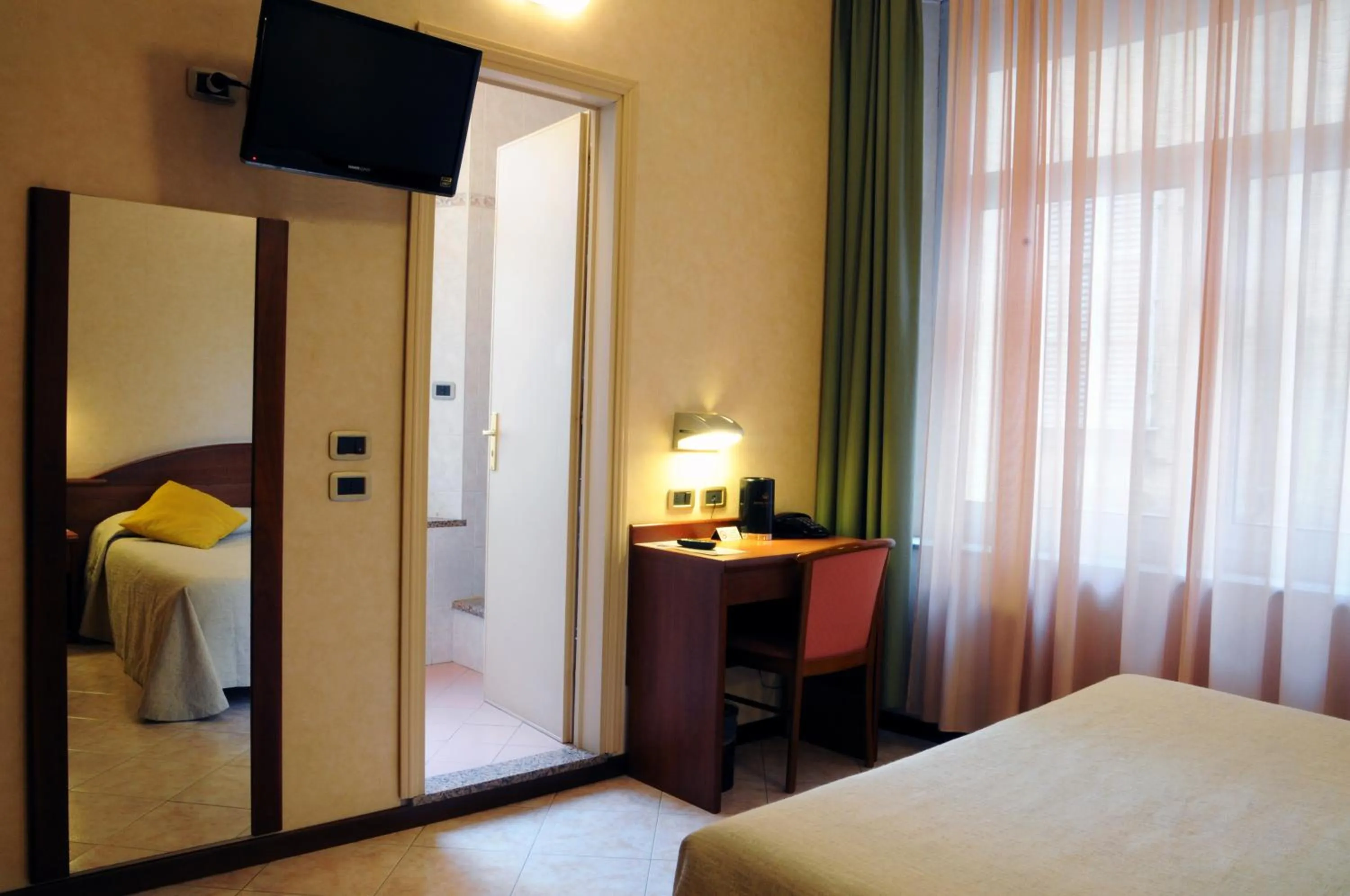 Photo of the whole room, Bed in Hotel Button