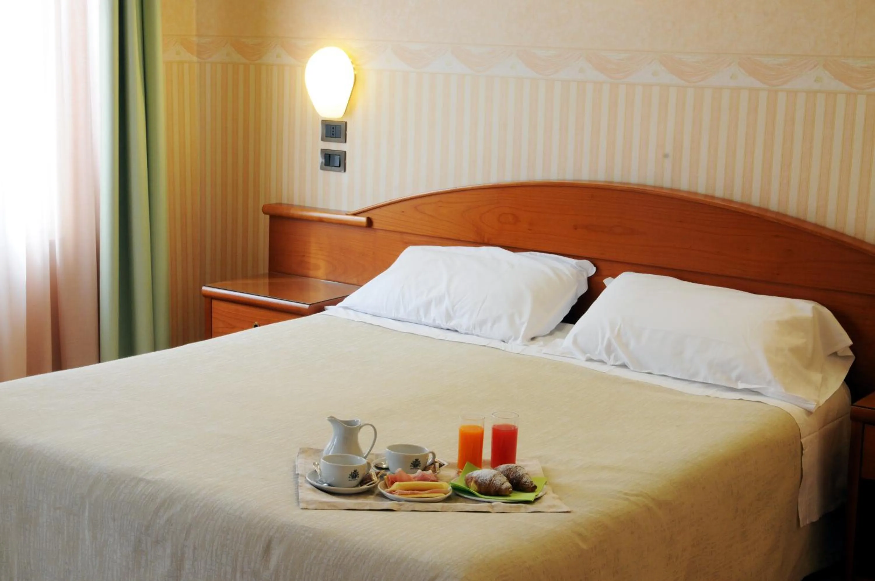 Photo of the whole room, Bed in Hotel Button