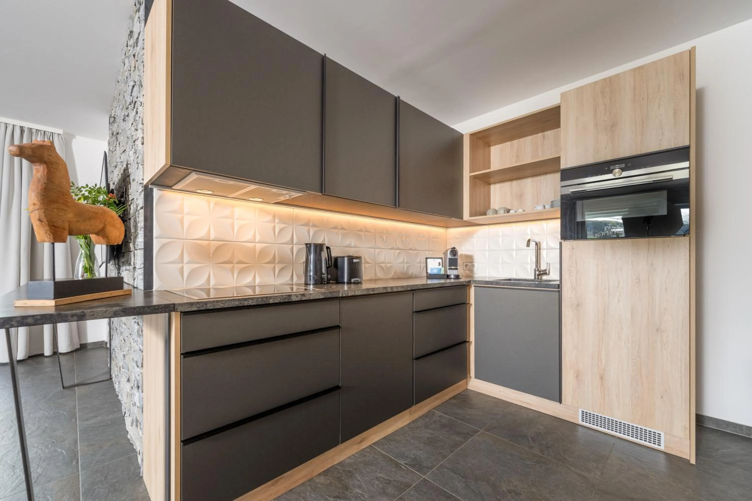 Kitchen or kitchenette in Stockinggut by AvenidA