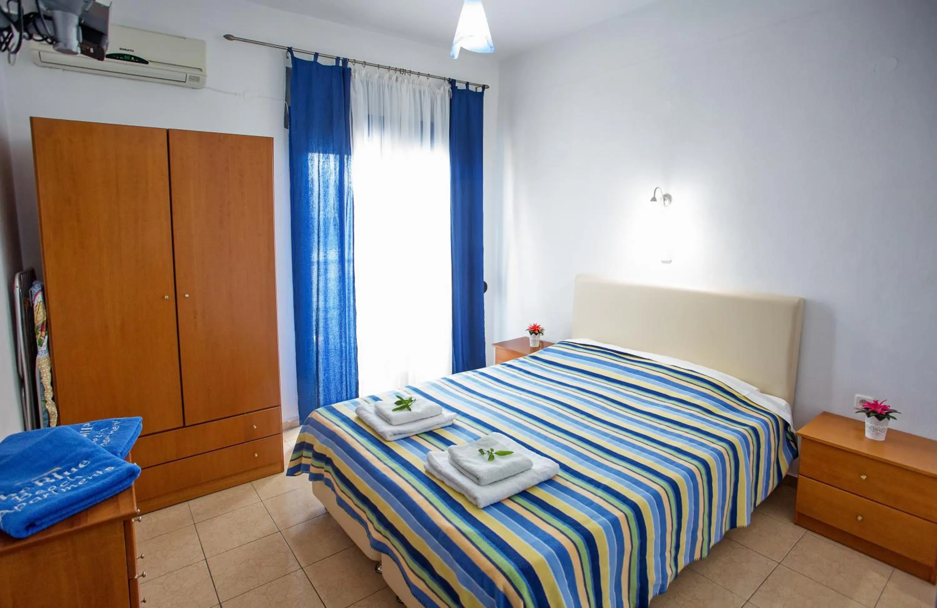 Bed in The Blue Beach Apartments