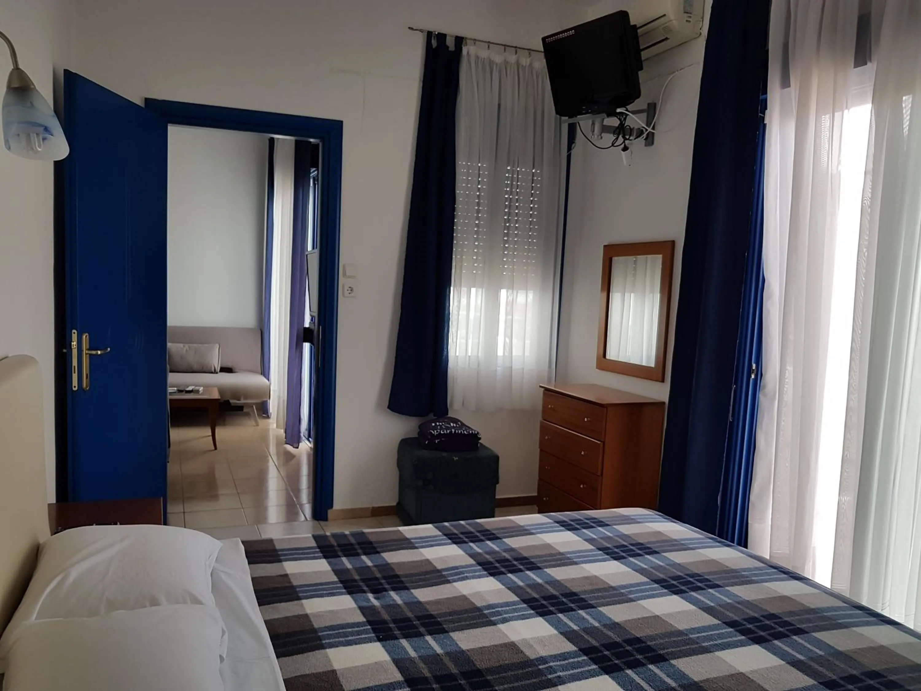 Bed in The Blue Beach Apartments