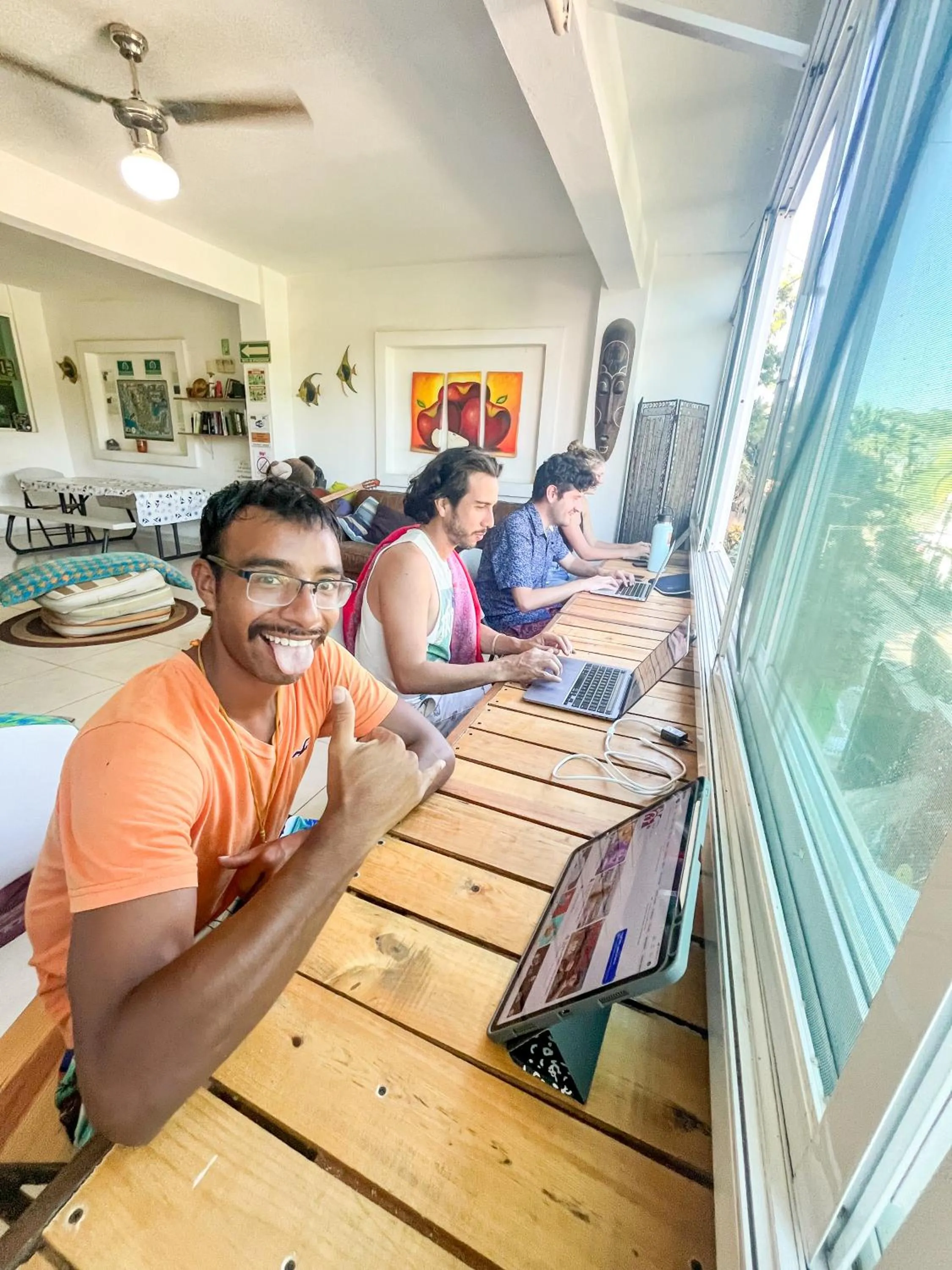 Communal lounge/ TV room in ITH Sayulita Amazing Surf Hostel