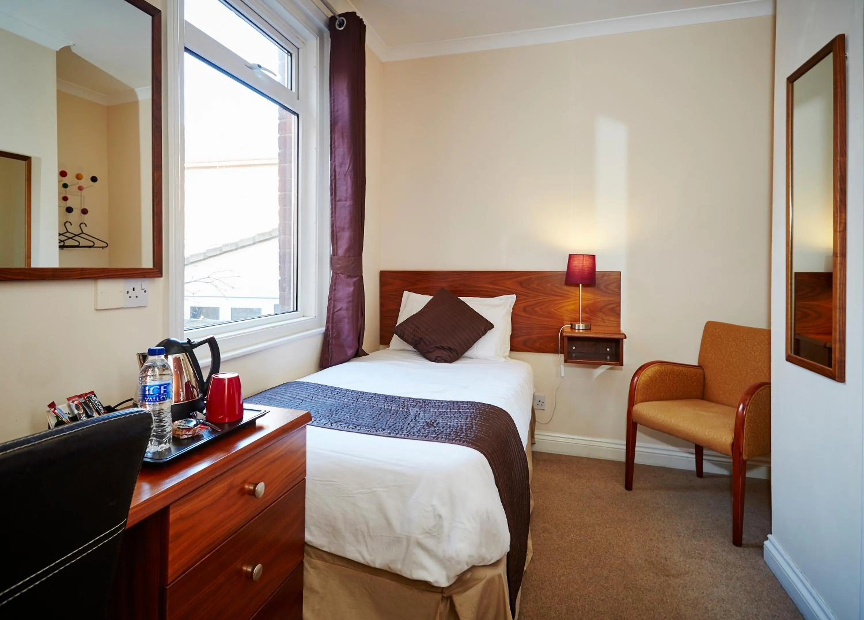 Bed in The Terrace Lodge Hotel