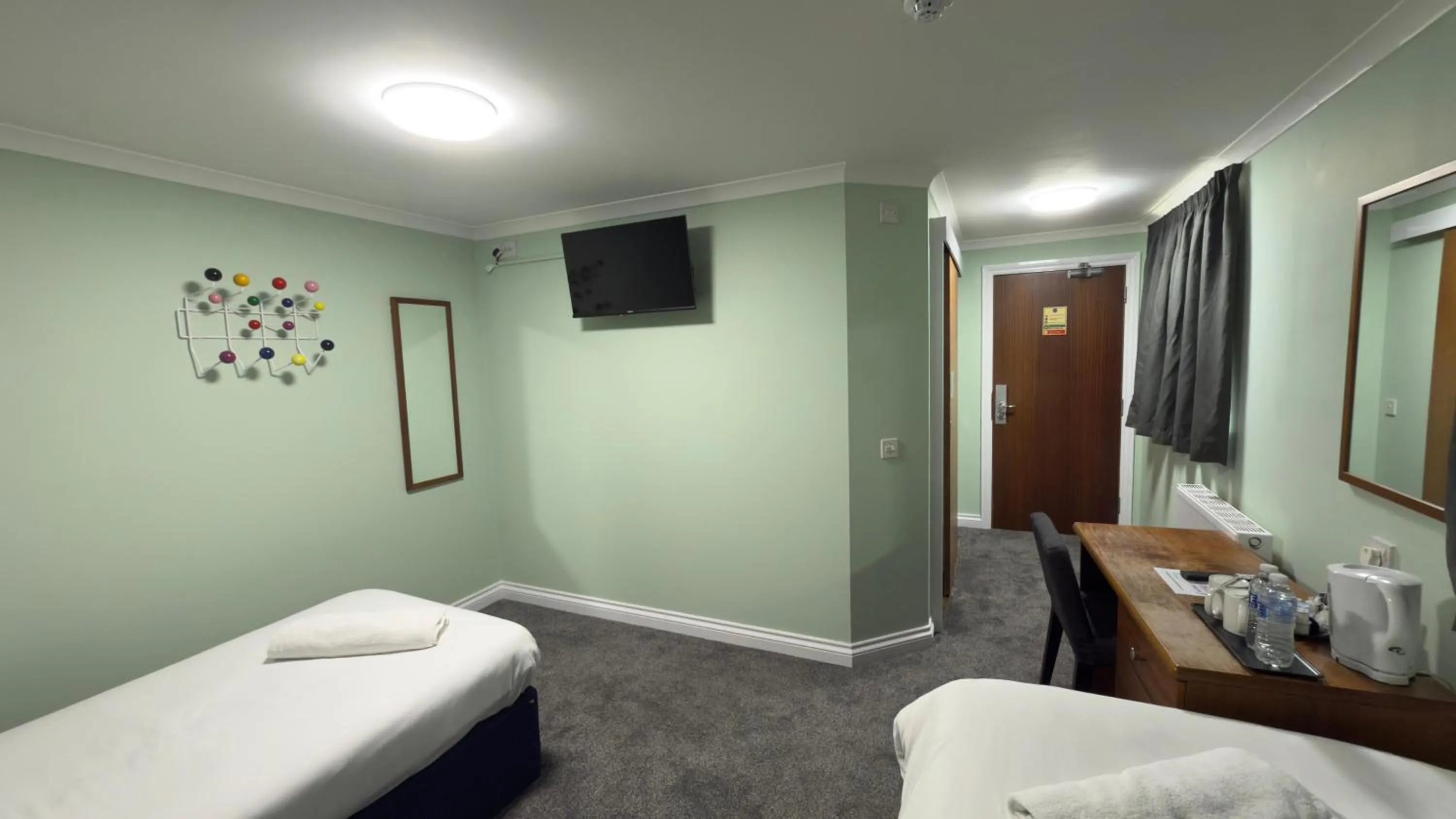 Bed in The Terrace Lodge Hotel