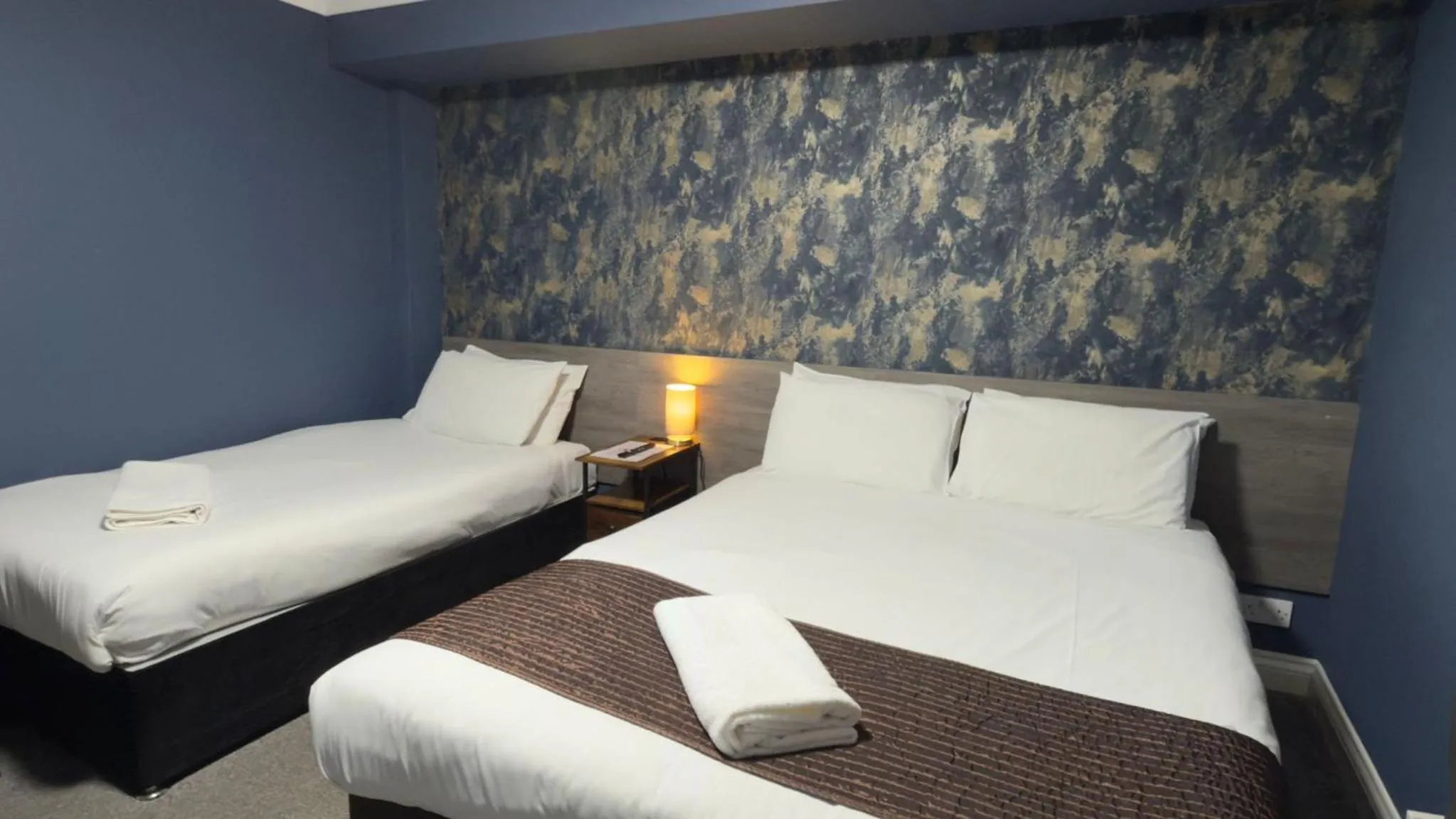 Bed in The Terrace Lodge Hotel