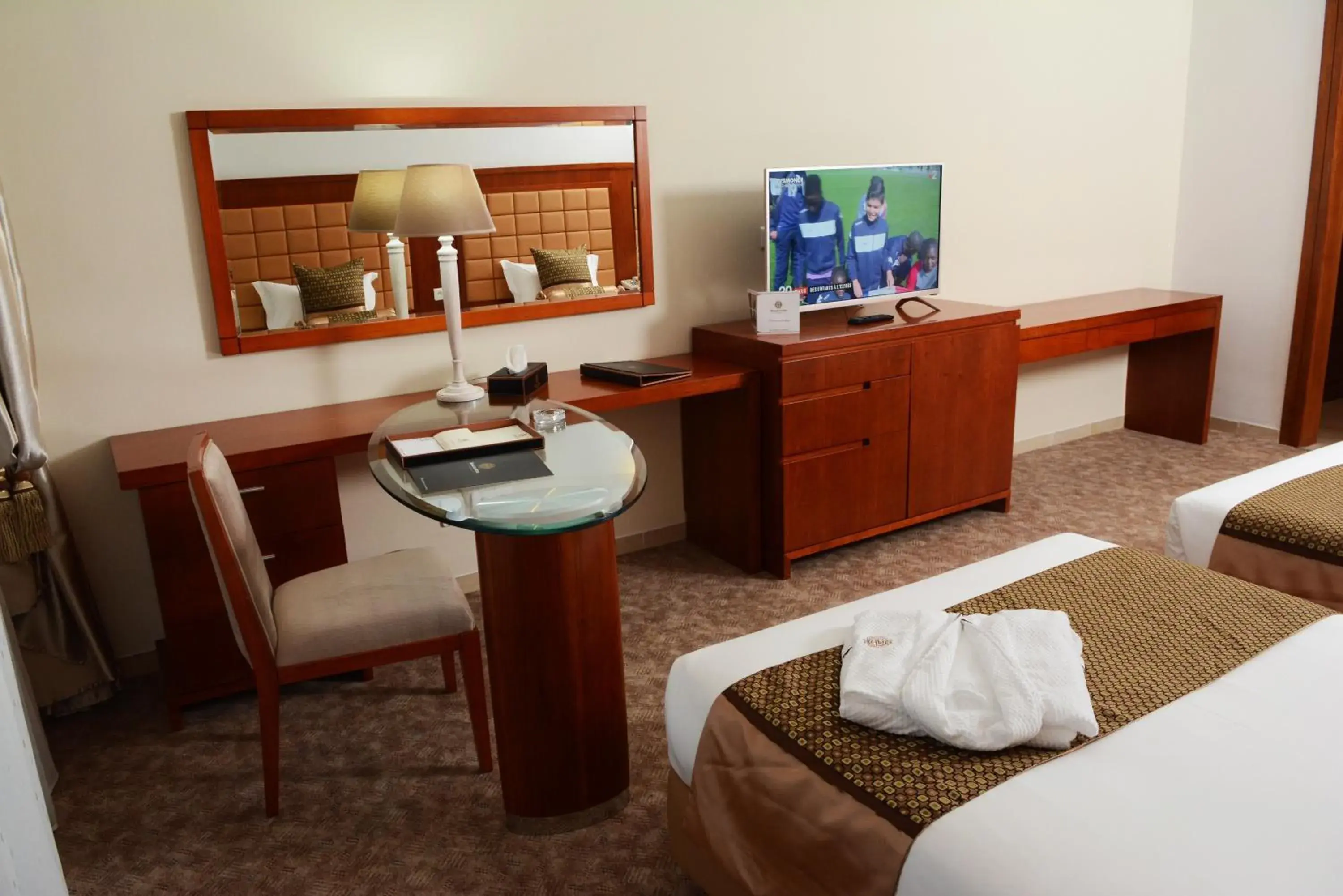 Seating area, Bed in Marigold Hotel Seating area, Bed in Marigold Hotel