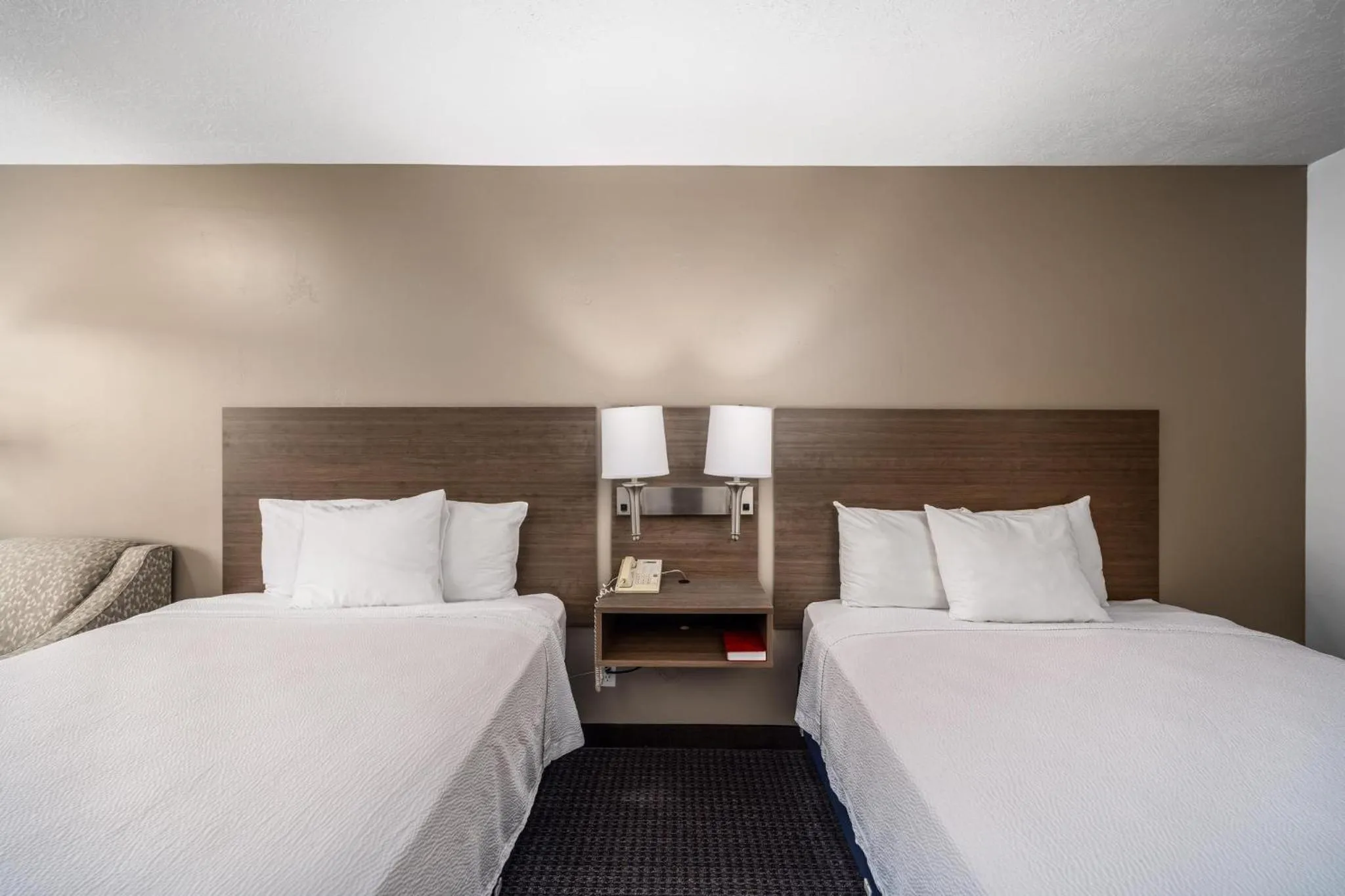 Bed in St. George Inn and Suites