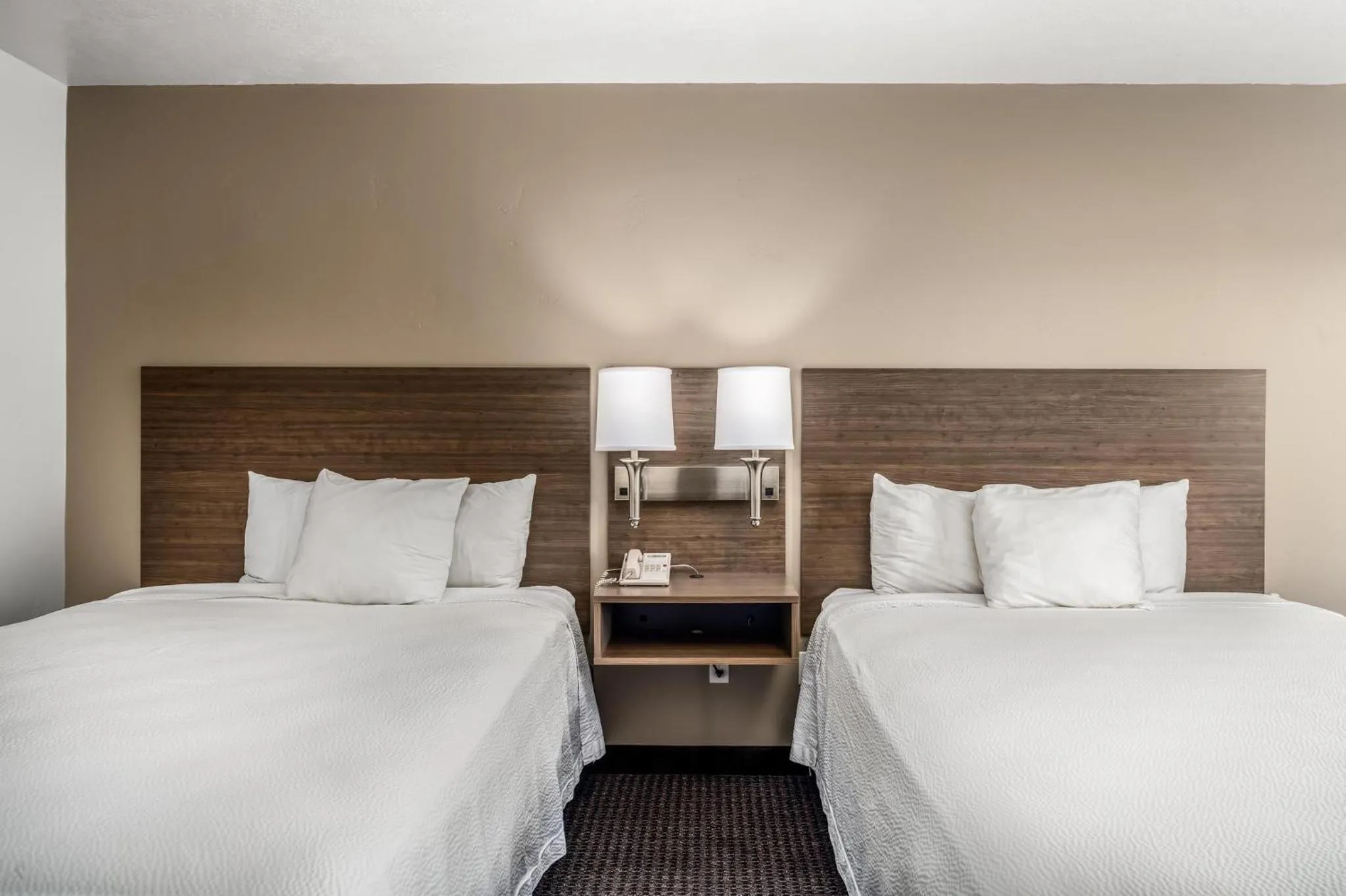 Bed in St. George Inn and Suites