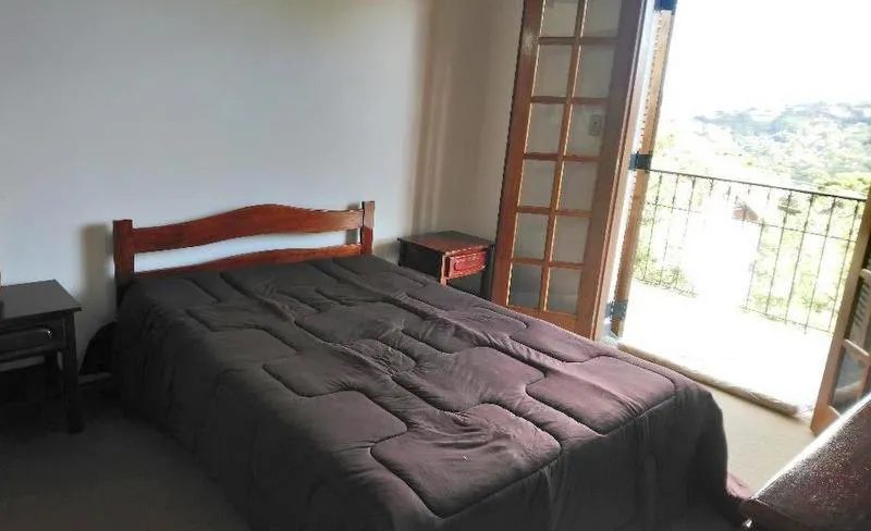 Bedroom, Bed in Apartamento Campos do Jordao