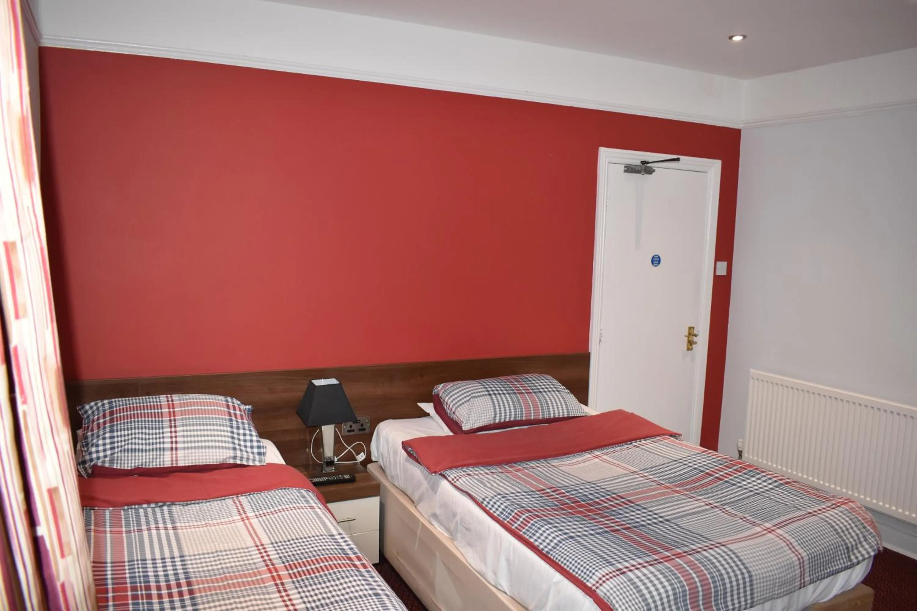 Bed in Swandown Hotel