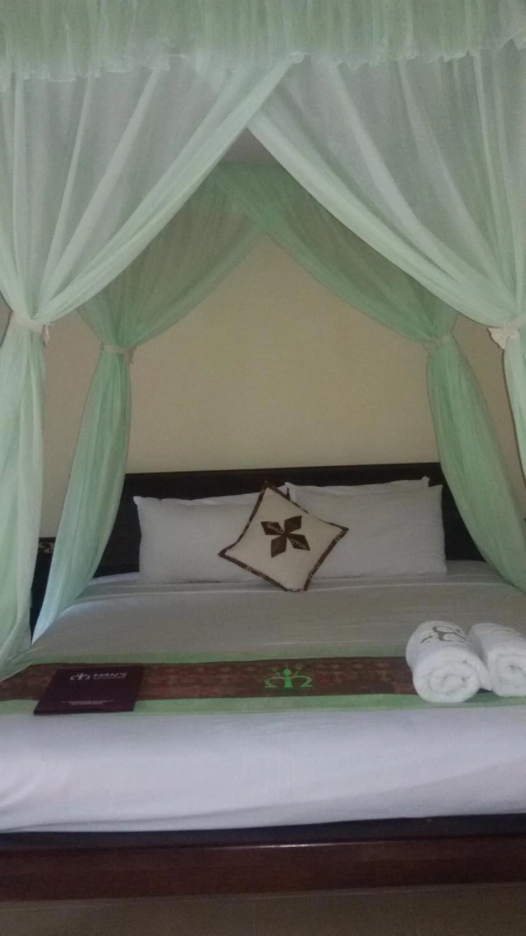 Bed in Mans Cottages & Spa