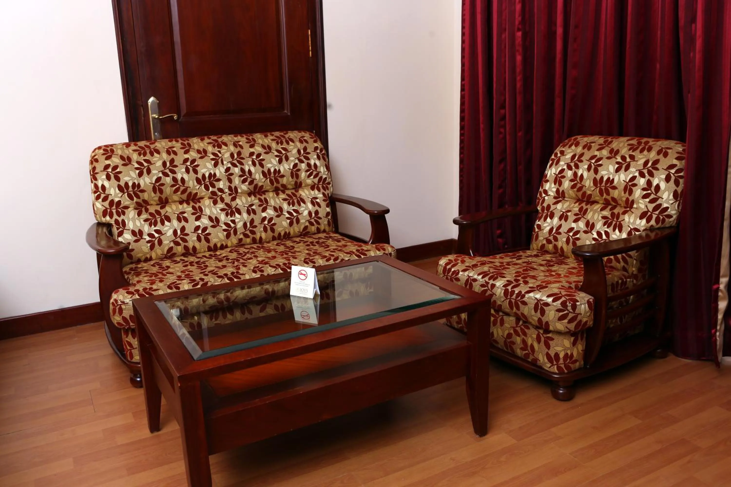 Living room in Joys Palace Hotel