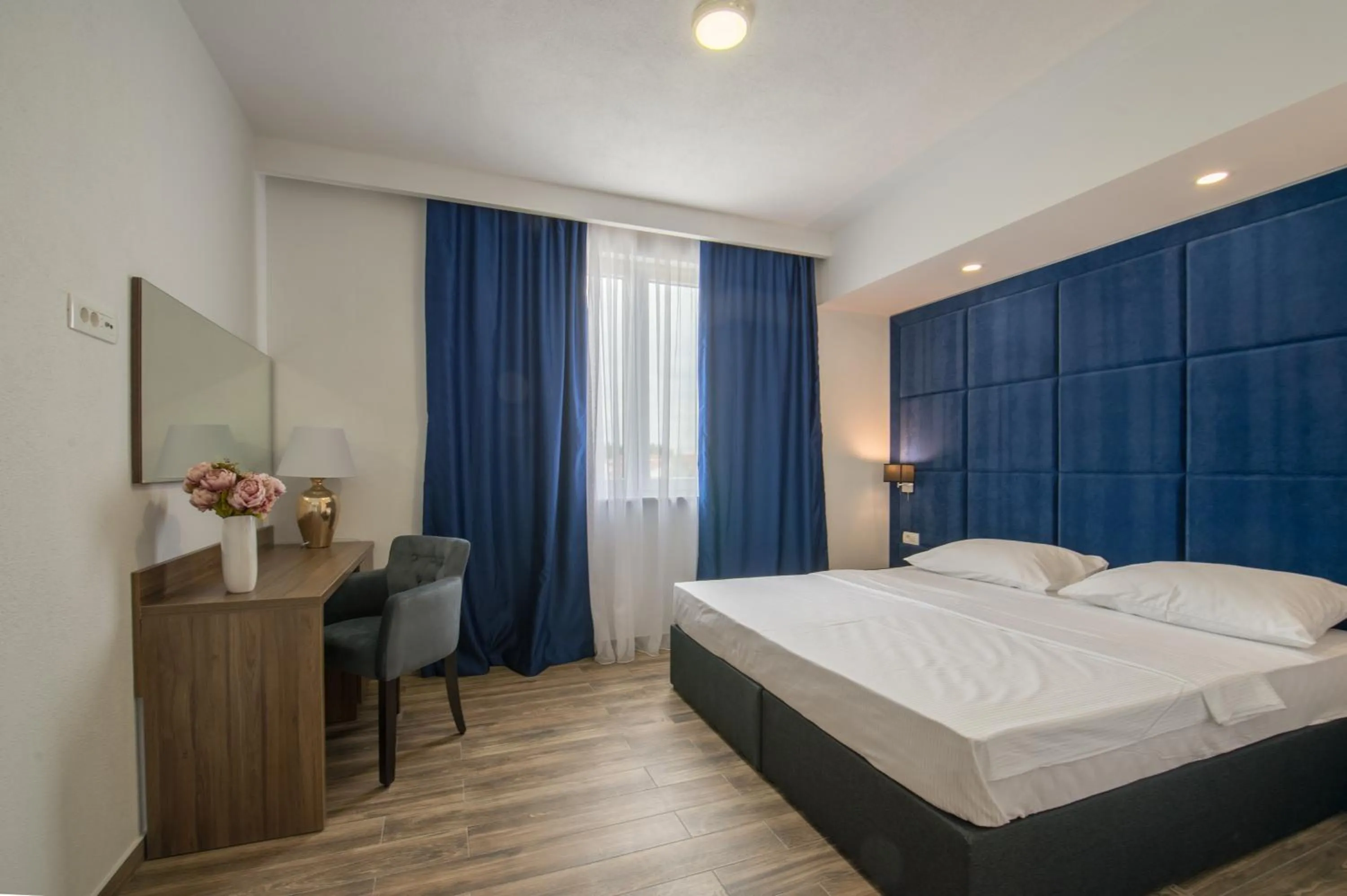 Hotel Tau