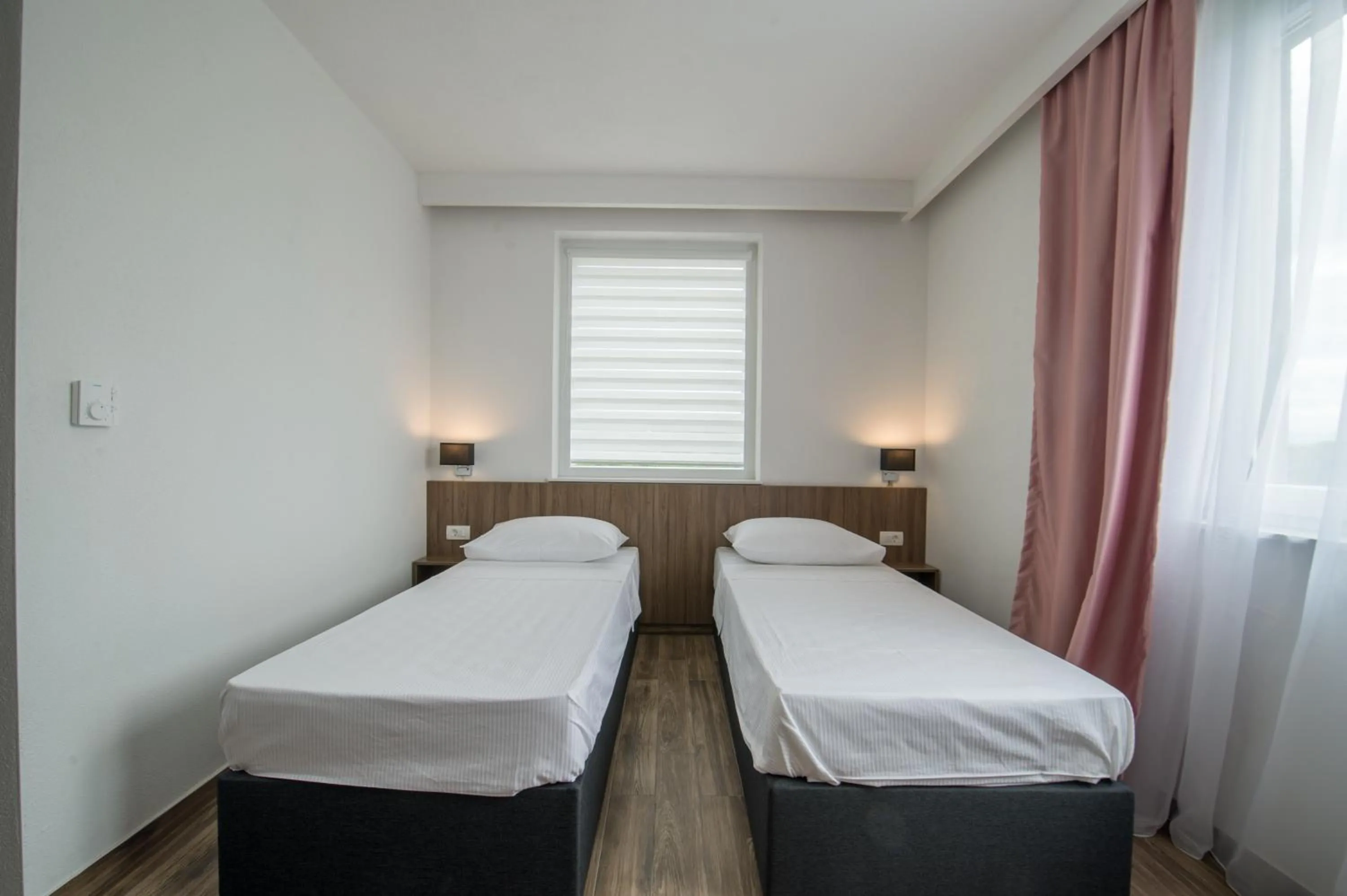 Hotel Tau