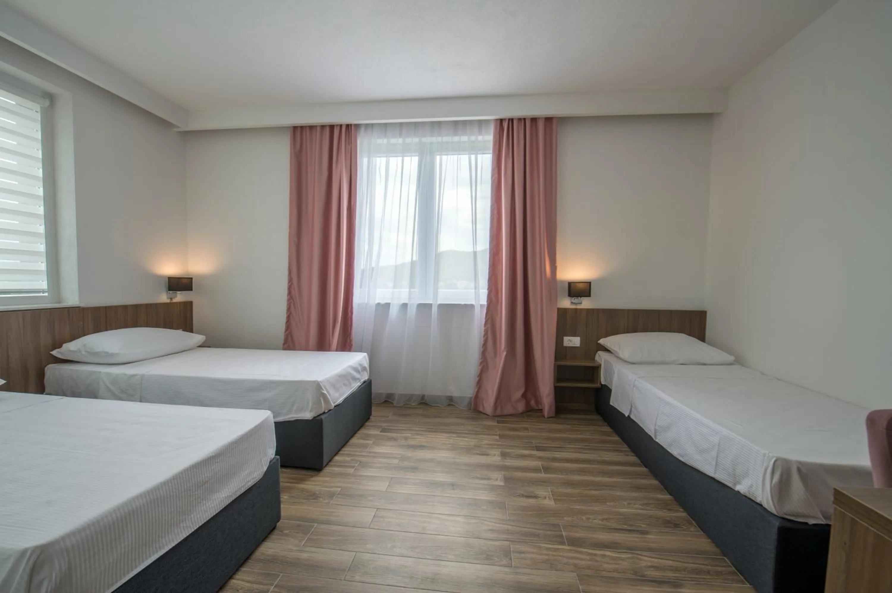 Hotel Tau
