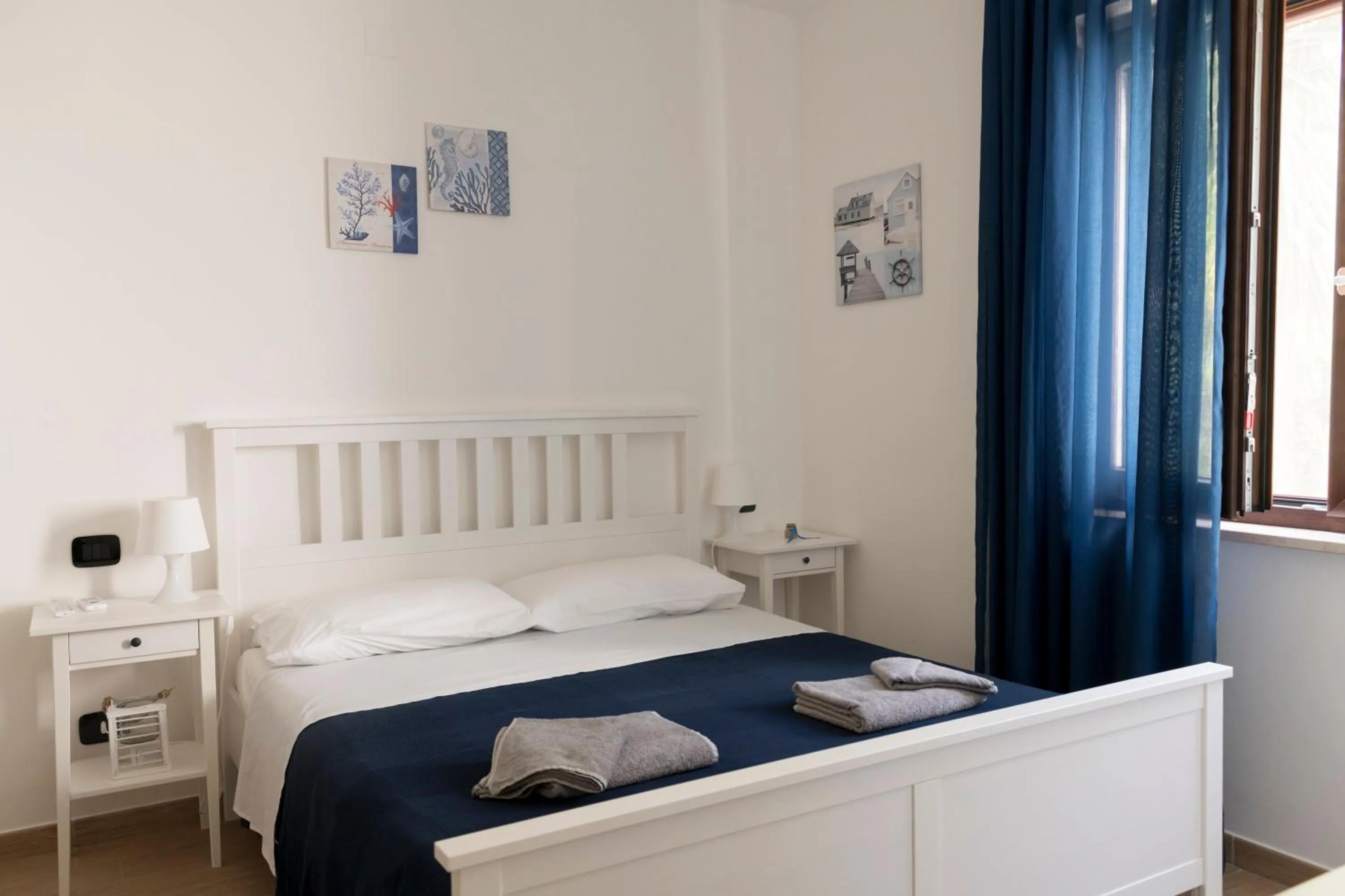 Photo of the whole room, Bed in L'oasi di Giorgia