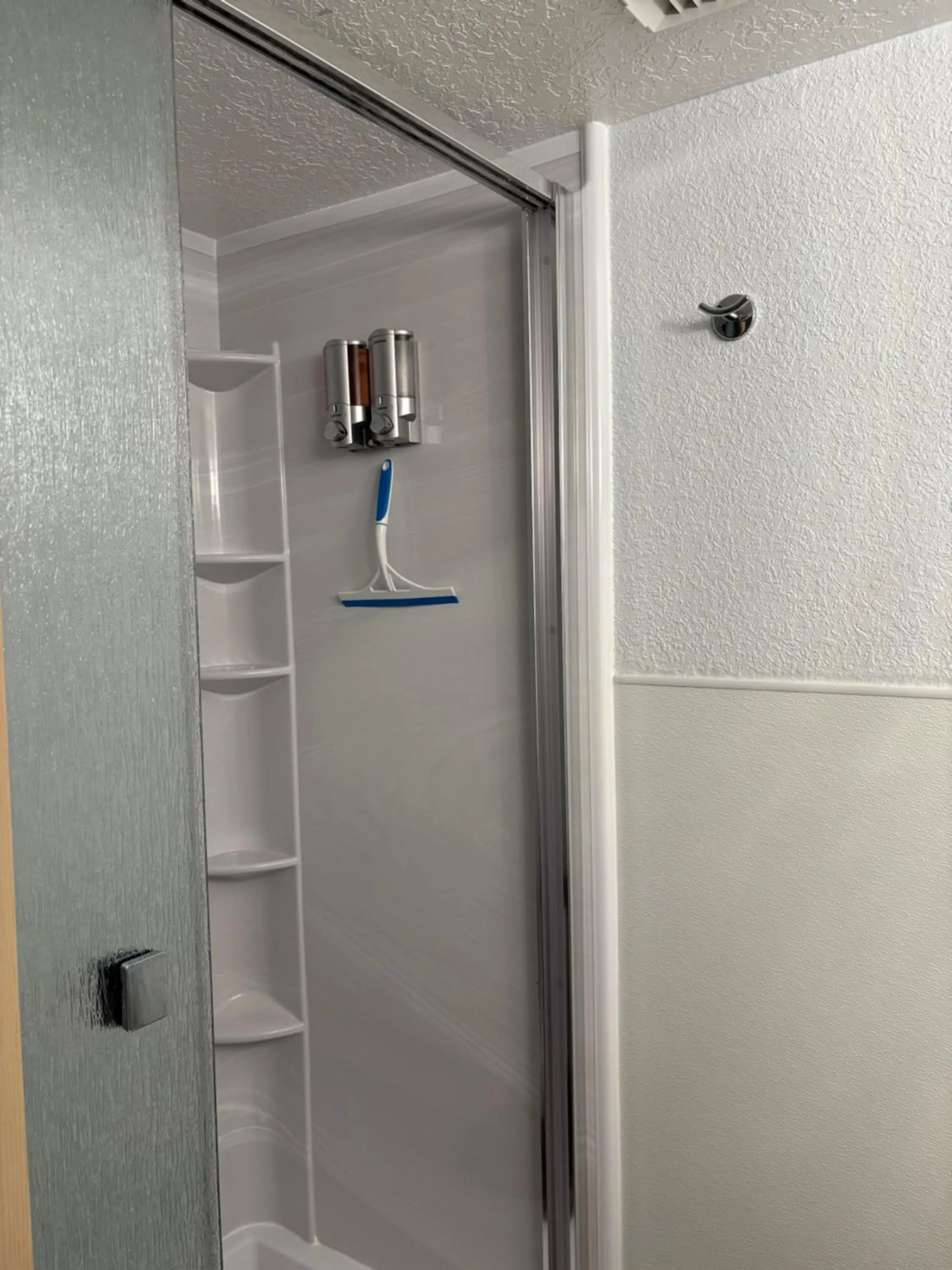 Shower in The Victorian Condo/Hotel