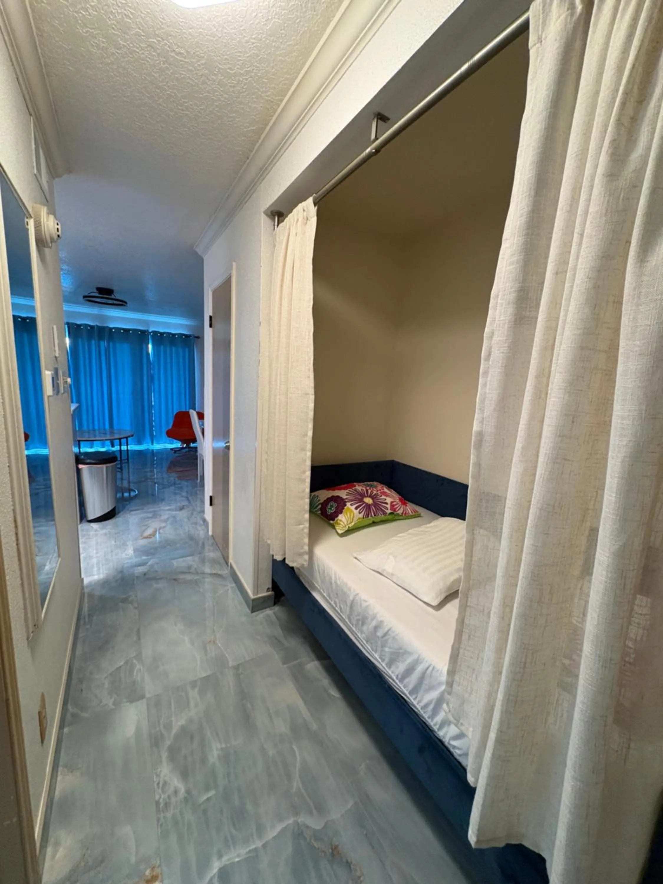 Bed in The Galveston Victorian Condo