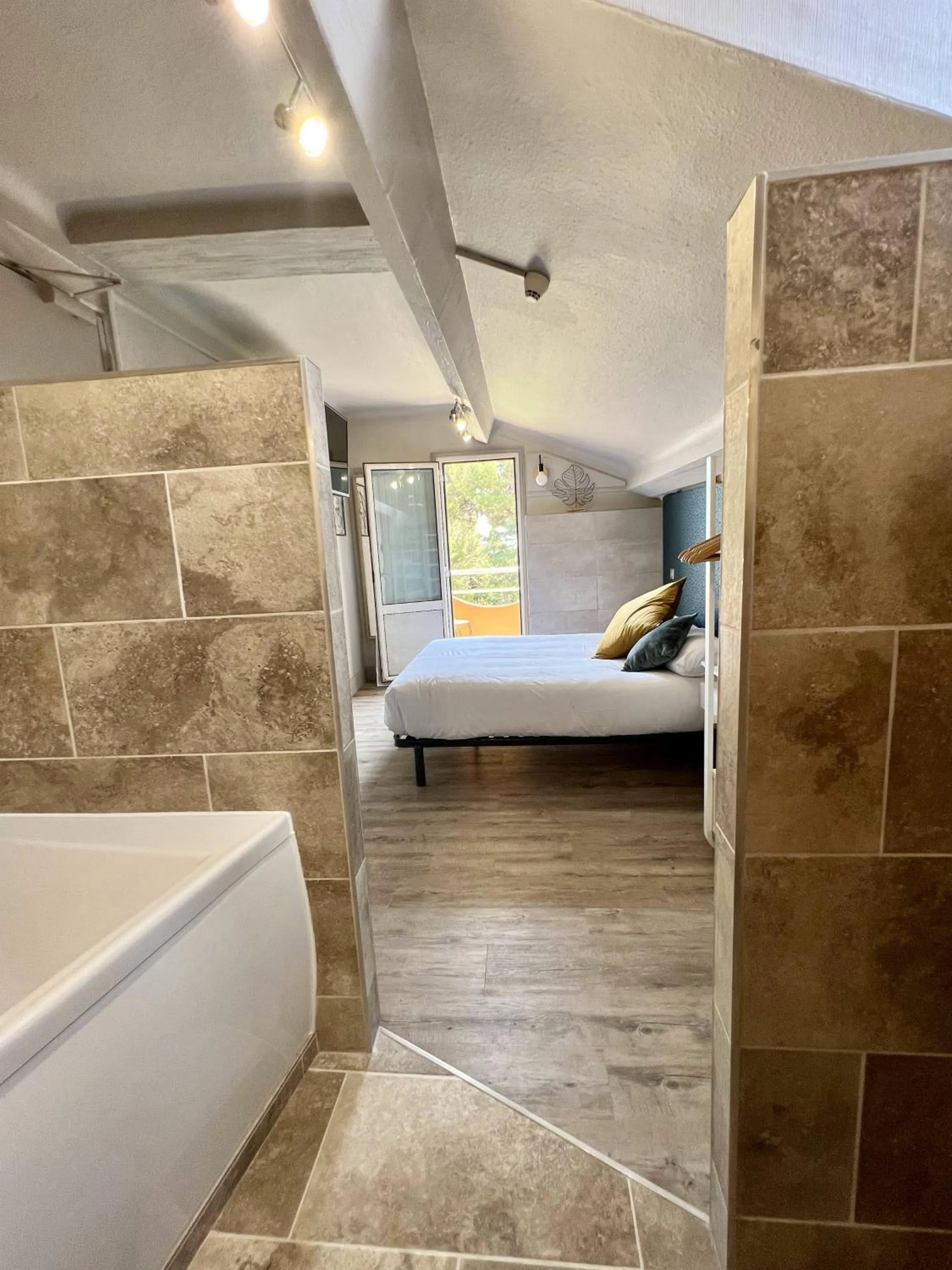 Bed in Hotel La Calanque