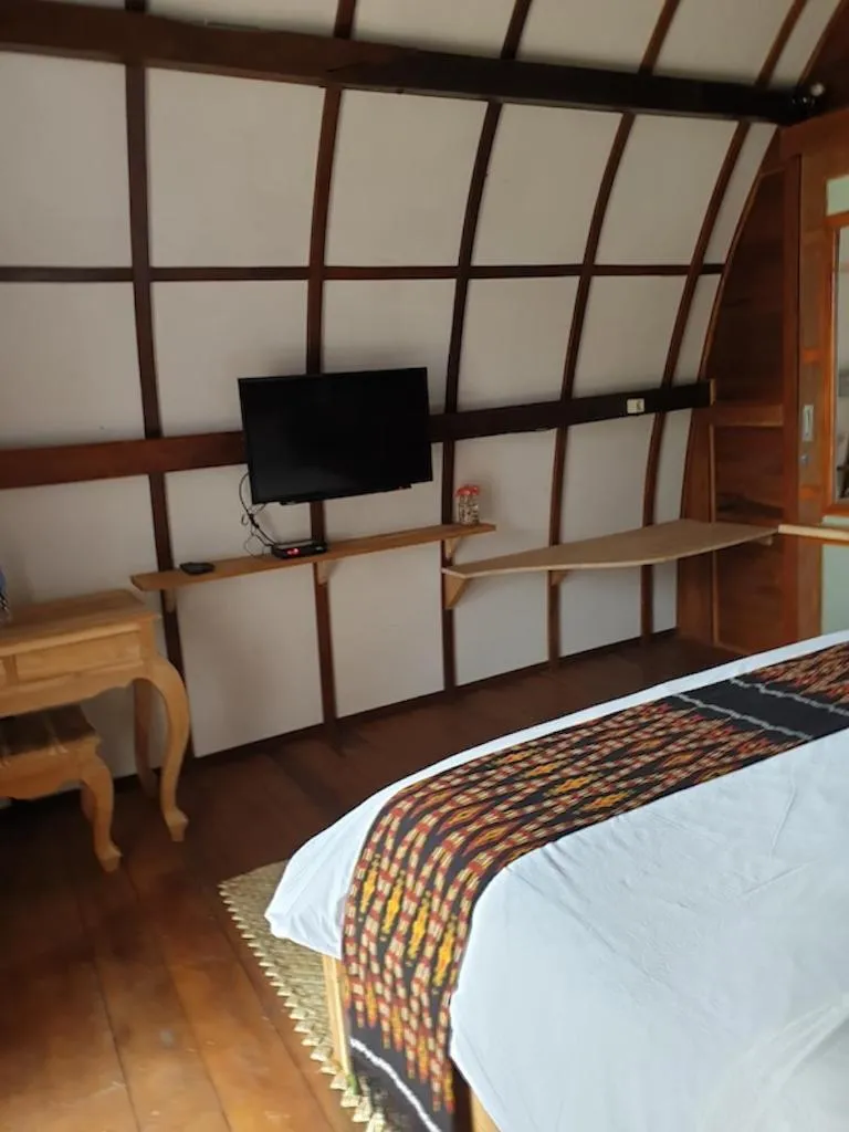 Bed in Mario Hotel and Cafe