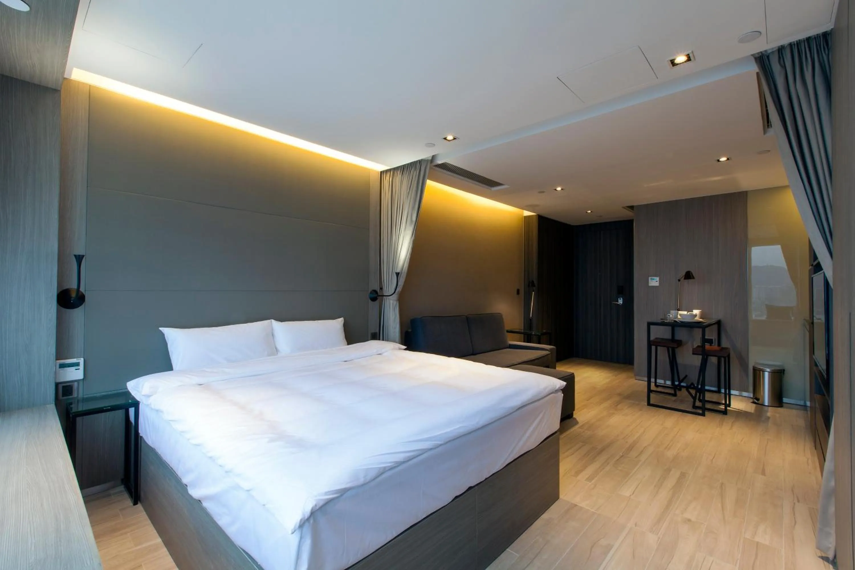 Bed in CM+ Hotels and Serviced Apartments