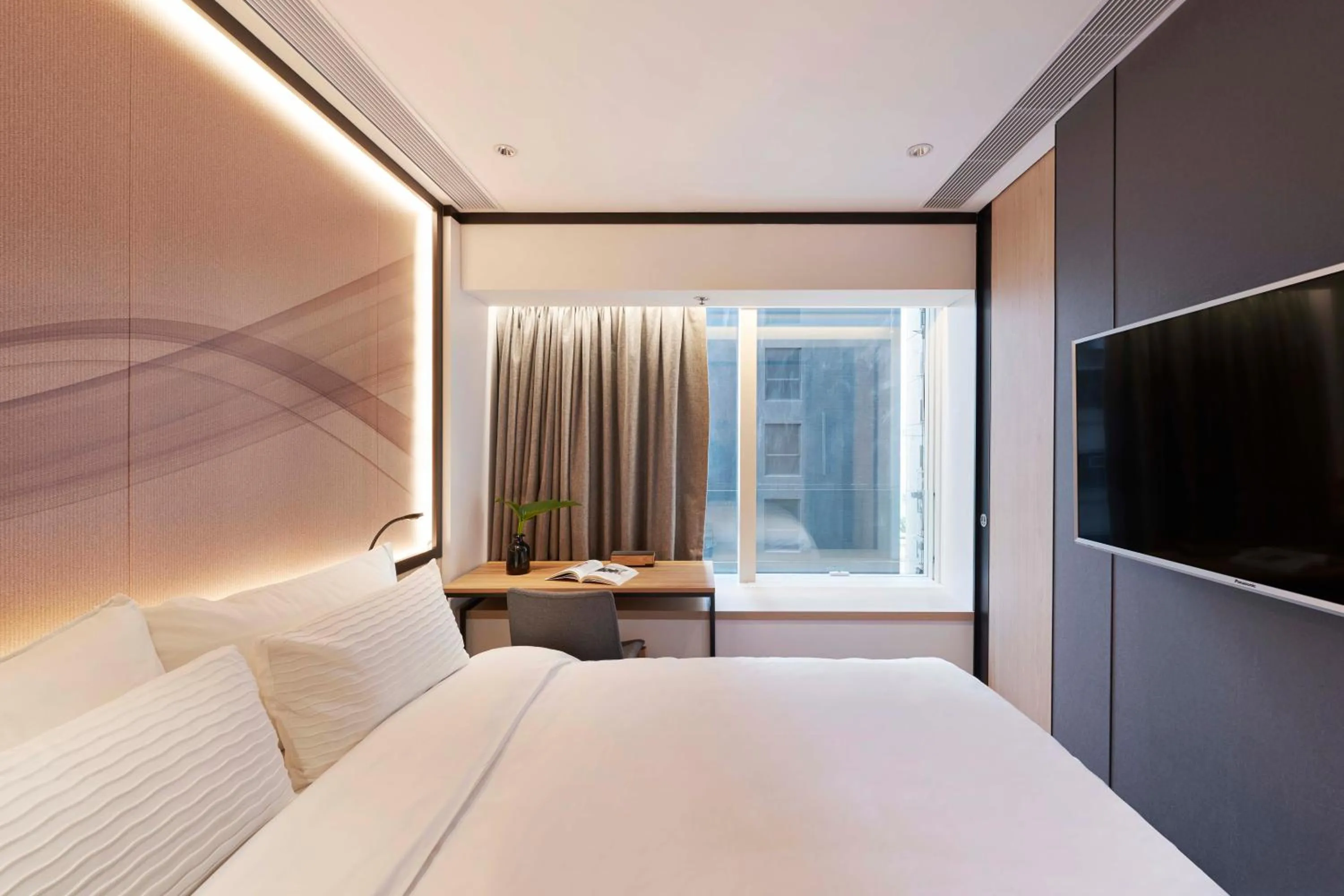 Bed in CM+ Hotels and Serviced Apartments