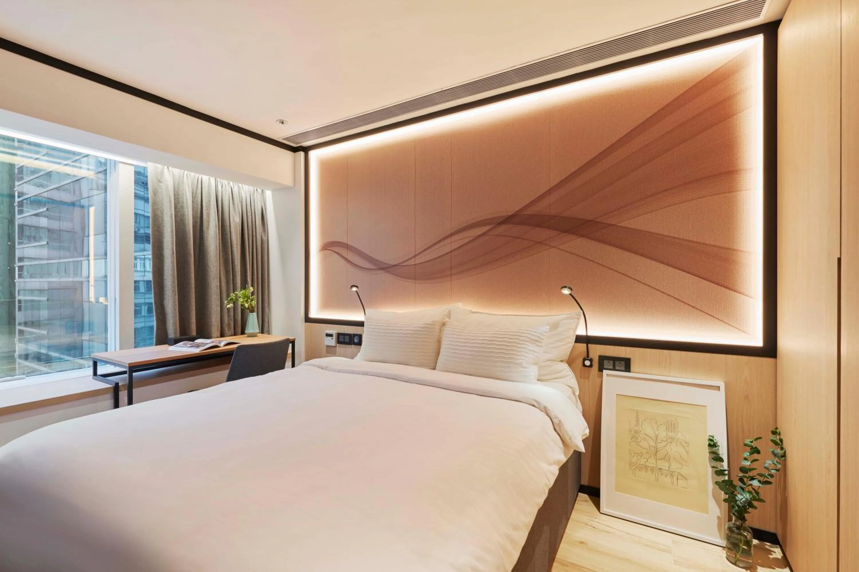 Bed in CM+ Hotels and Serviced Apartments