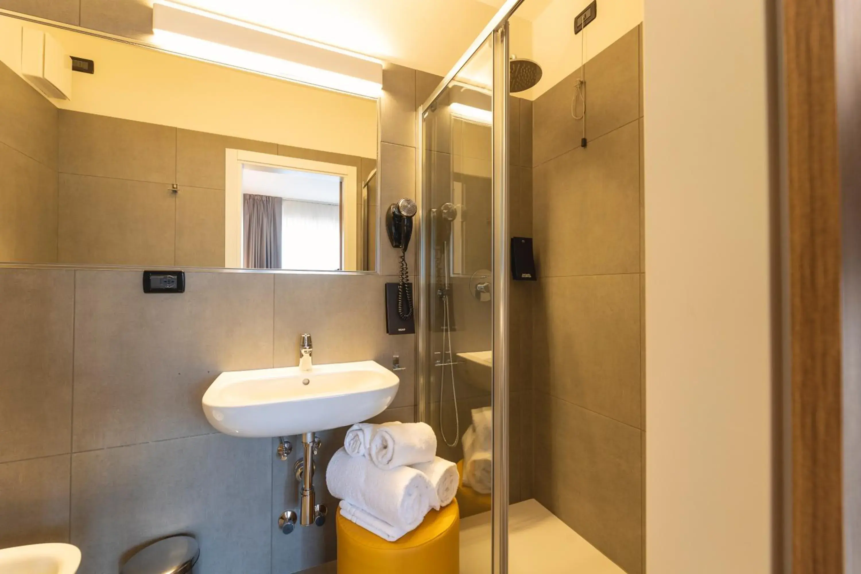 Bathroom in Hi Hotels Trento - Wellness & Spa Adults Only Bathroom in Hi Hotels Trento - Wellness & Spa Adults Only