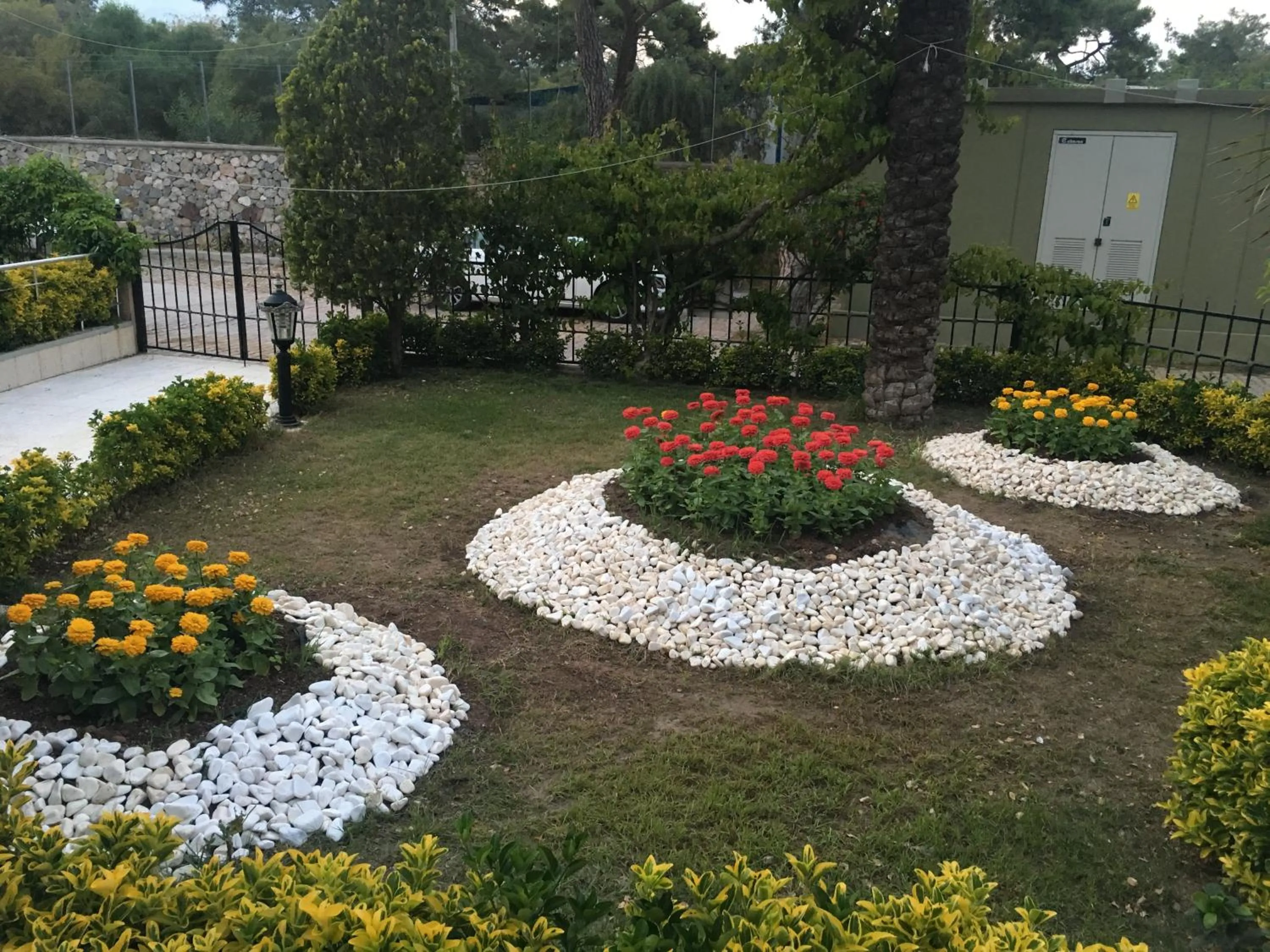 Garden in Aleria Belport Beach Hotel