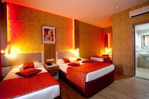 Photo of the whole room, Bed in Aleria Belport Beach Hotel