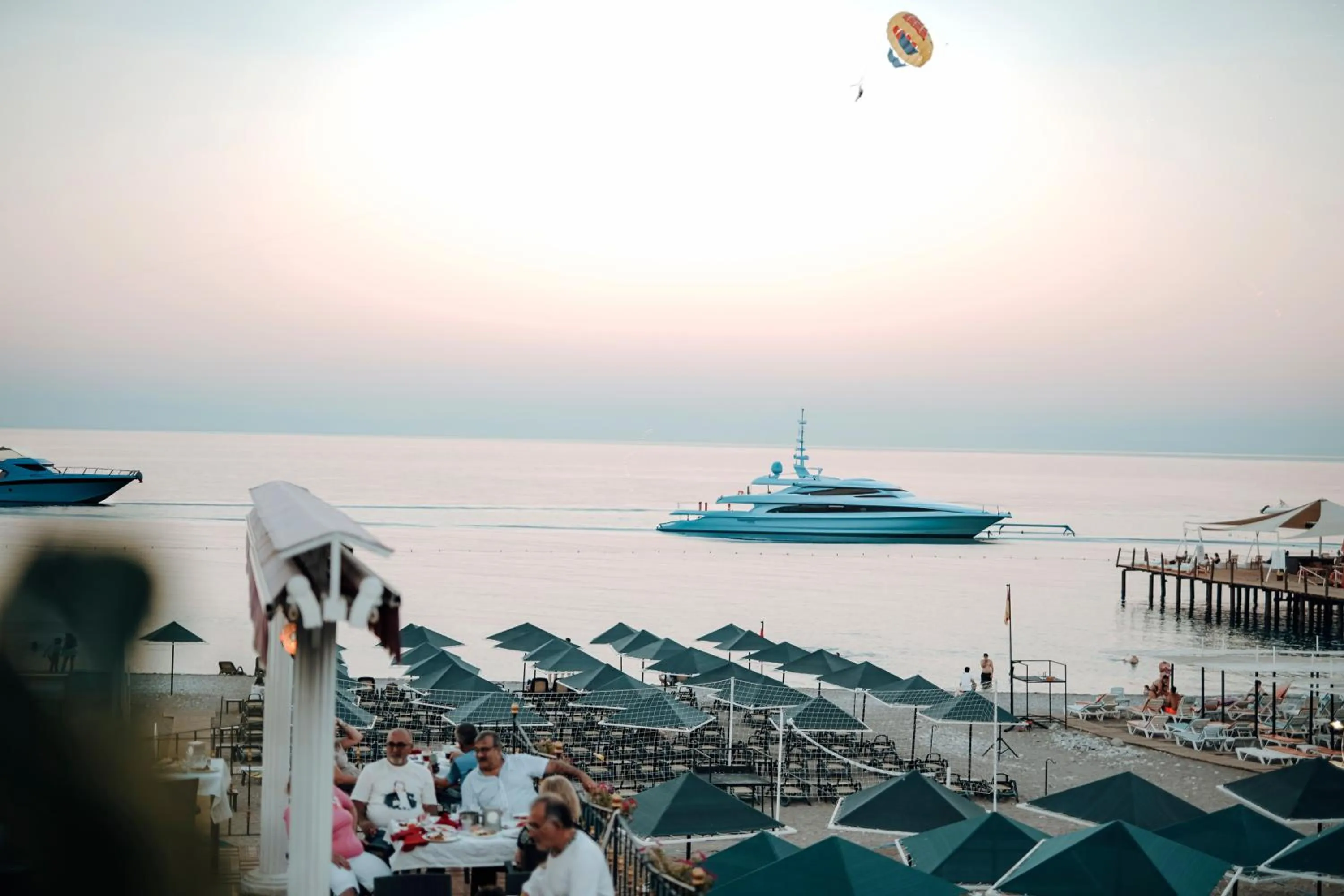 People in Aleria Belport Beach Hotel