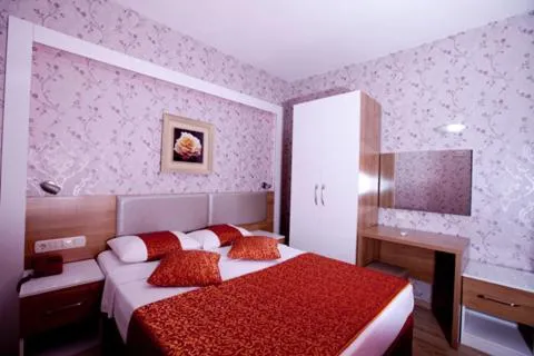 Photo of the whole room, Bed in Aleria Belport Beach Hotel