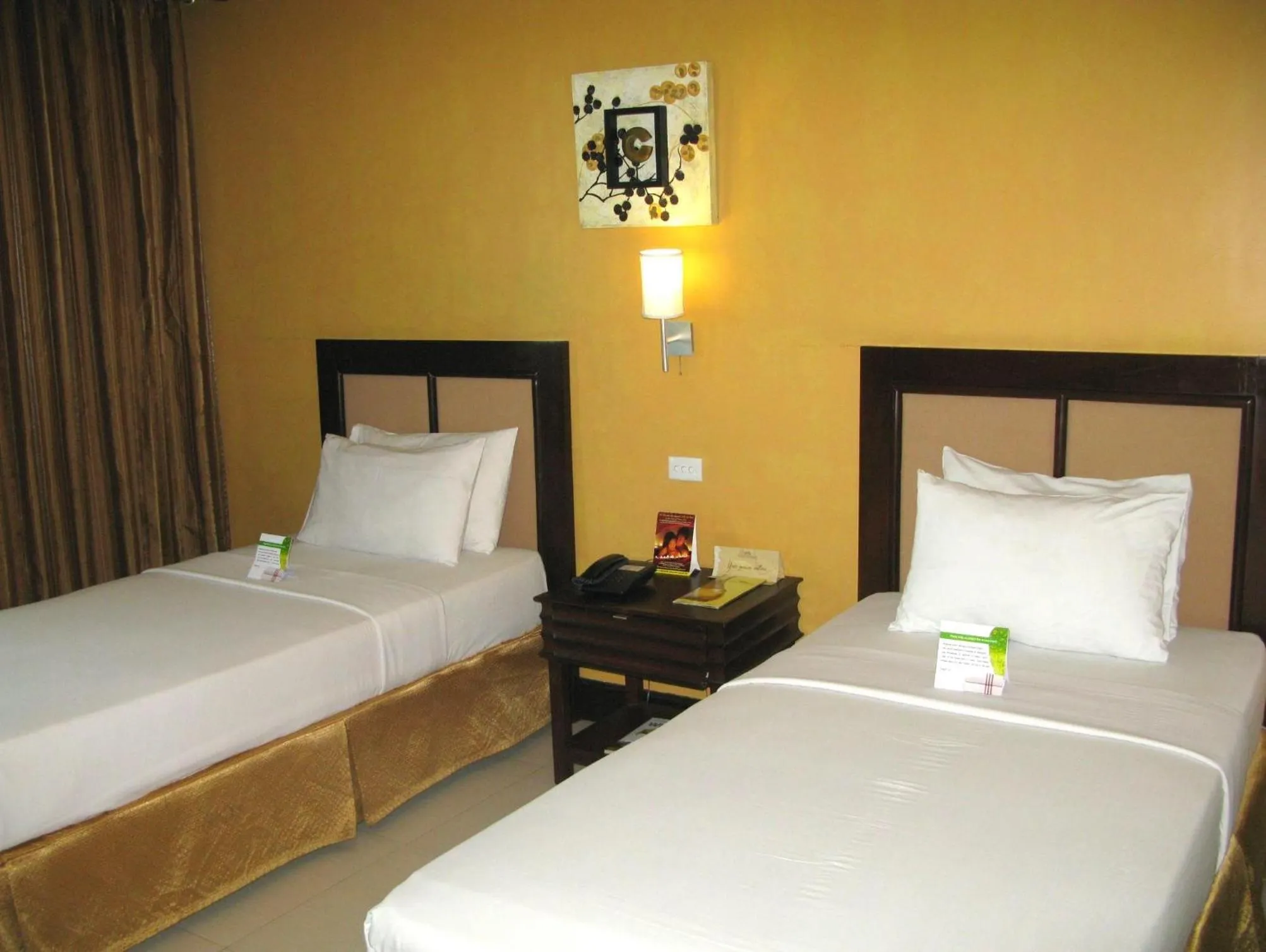 Property building, Bed in The Royal Mandaya Hotel