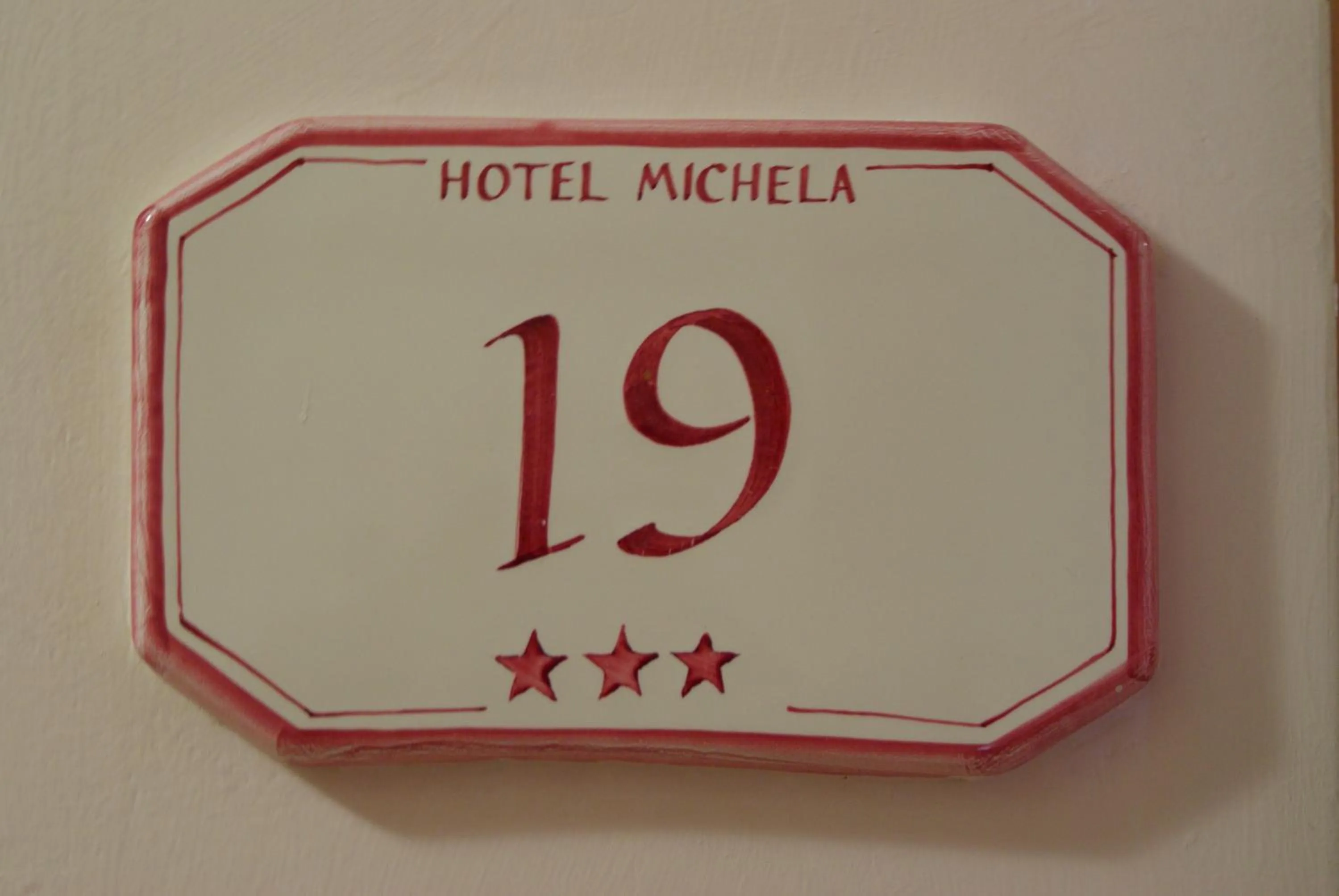 Logo/Certificate/Sign in Hotel Michela