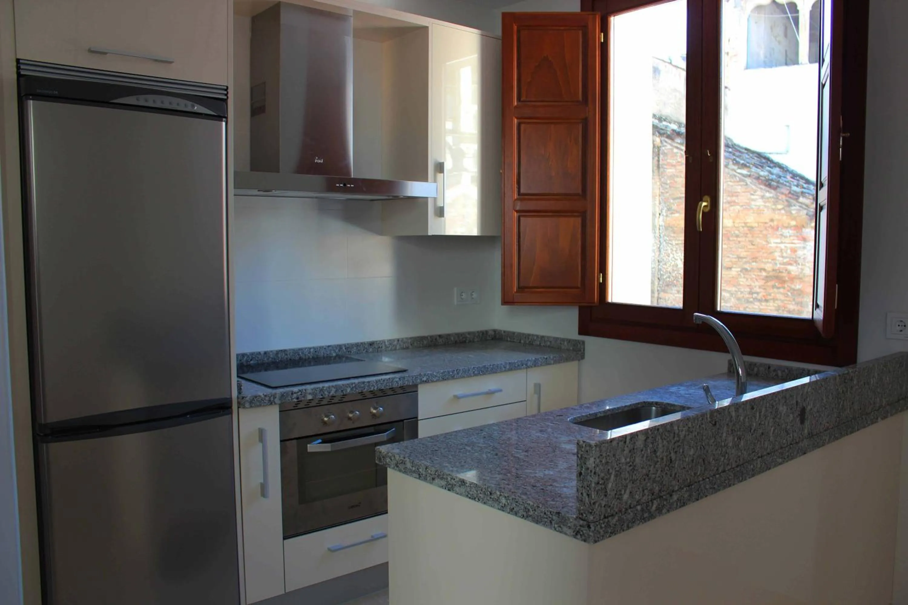 Kitchen or kitchenette in BiBo Suites Gran Vía