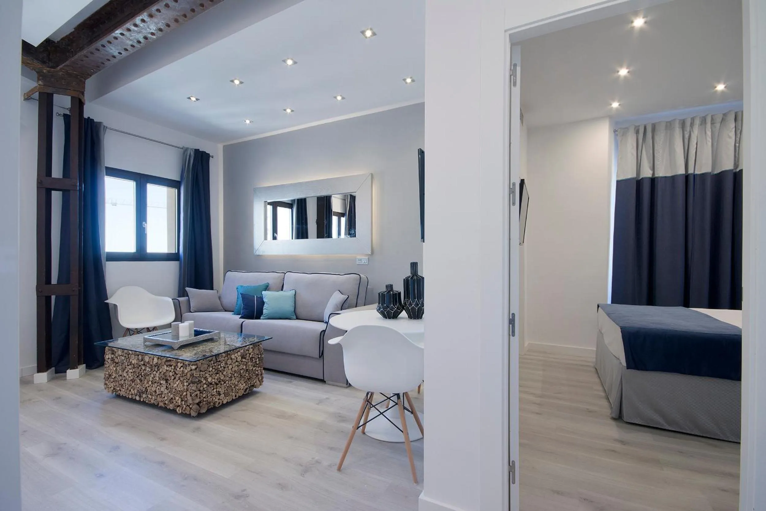 Living room, Bed in BiBo Suites Gran Vía