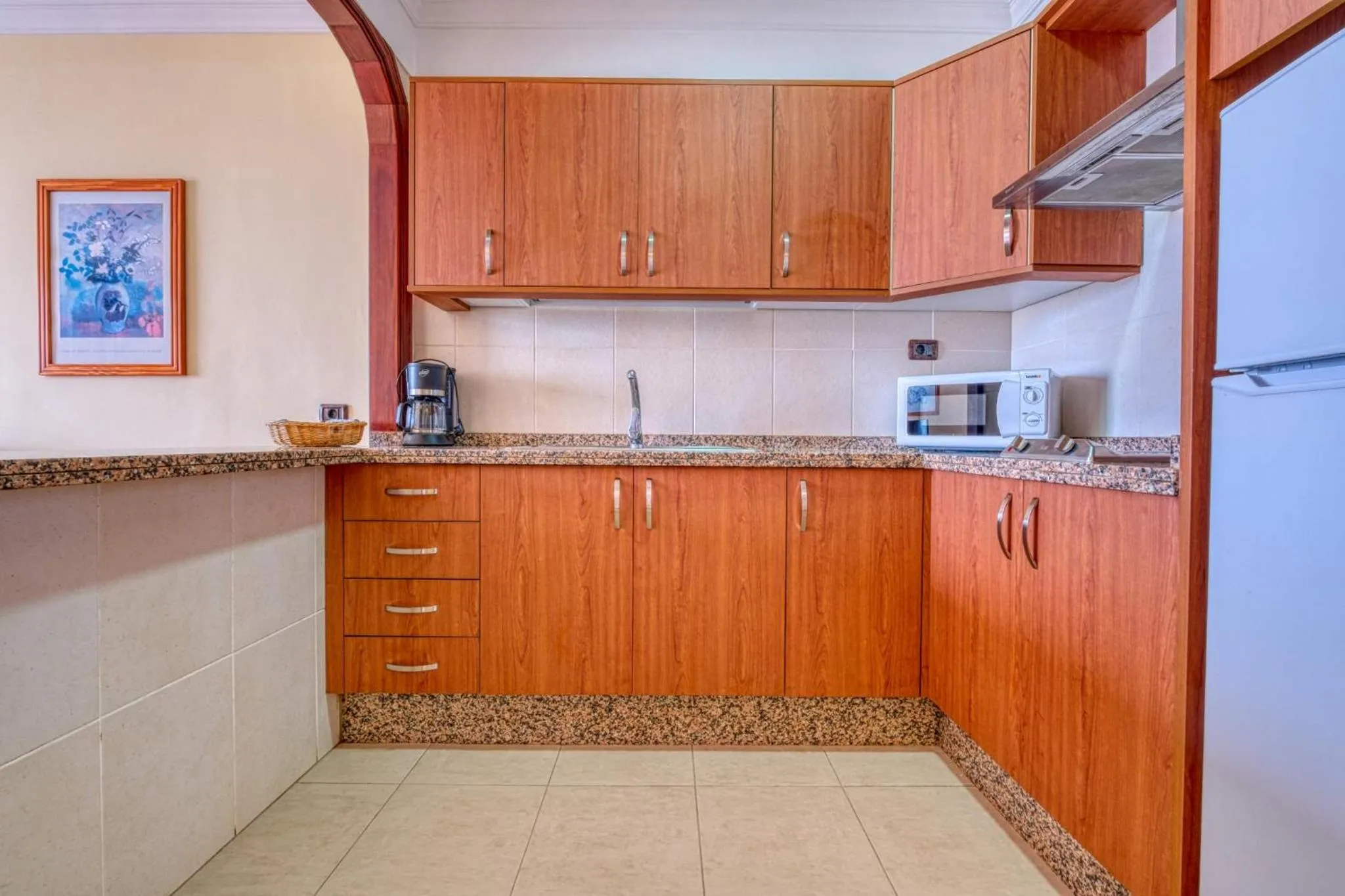 Kitchen or kitchenette in Apartamentos Callaomar