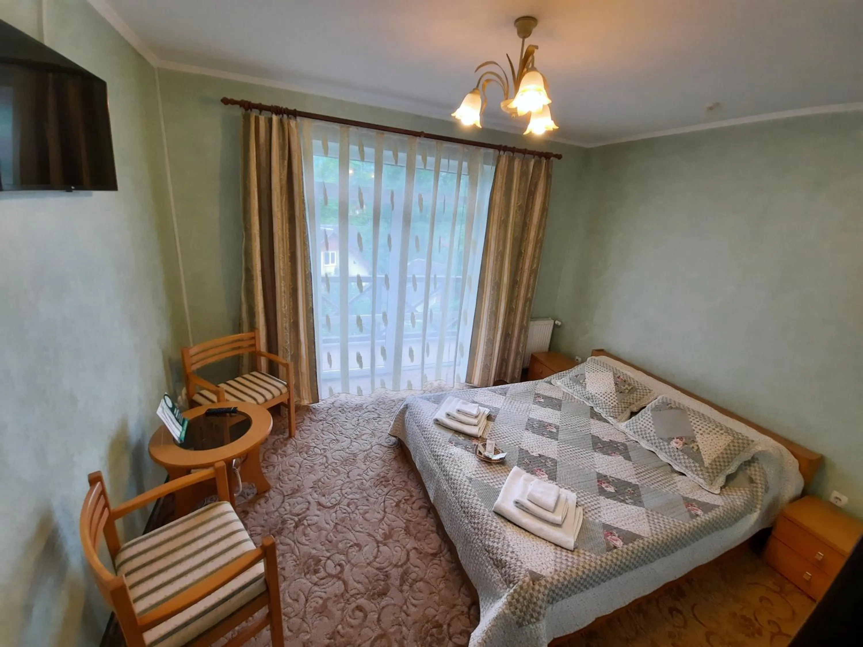 Photo of the whole room, Bed in Tsvit Paporoti