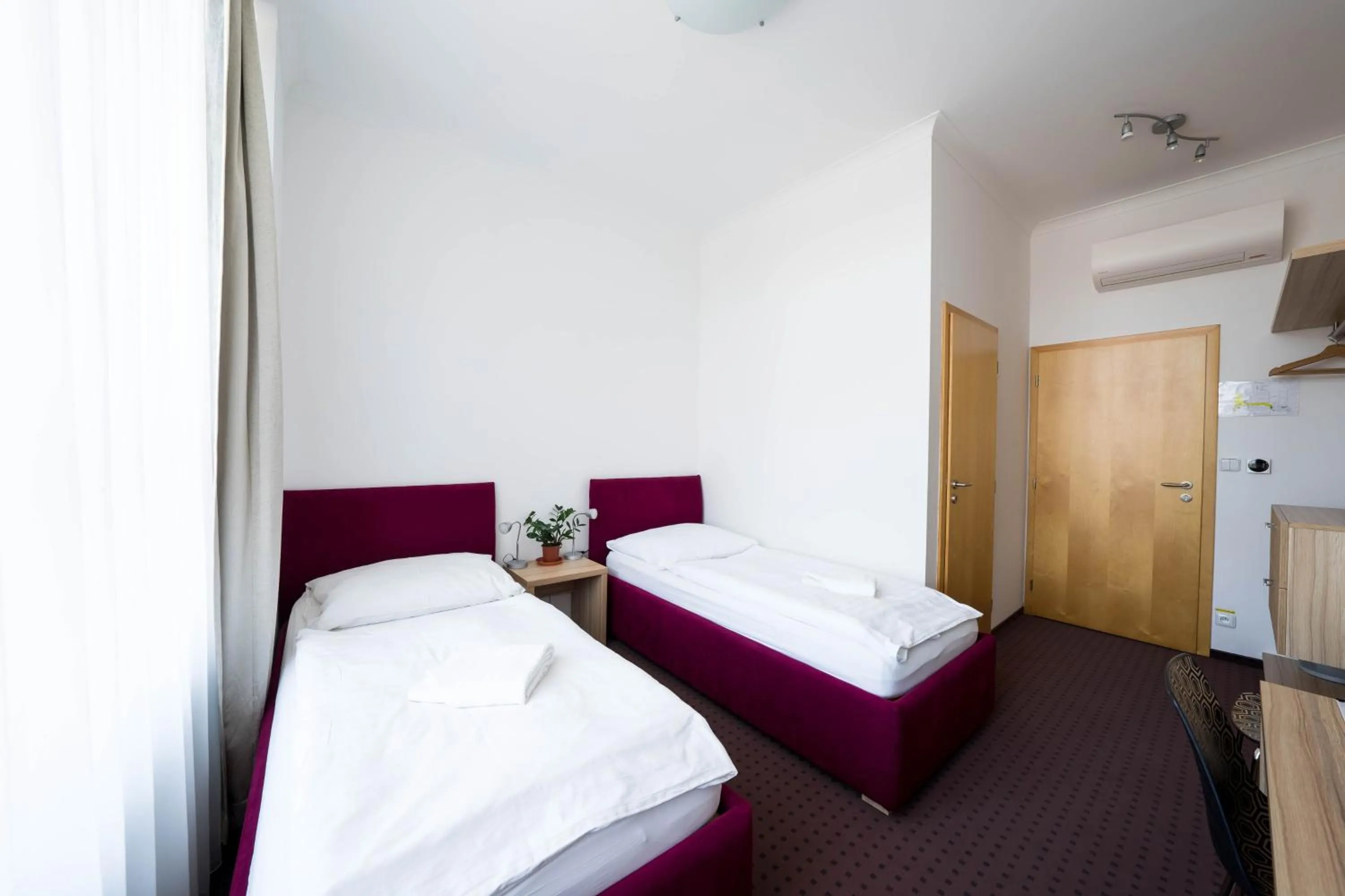 Bed in Mini Hotel Akord