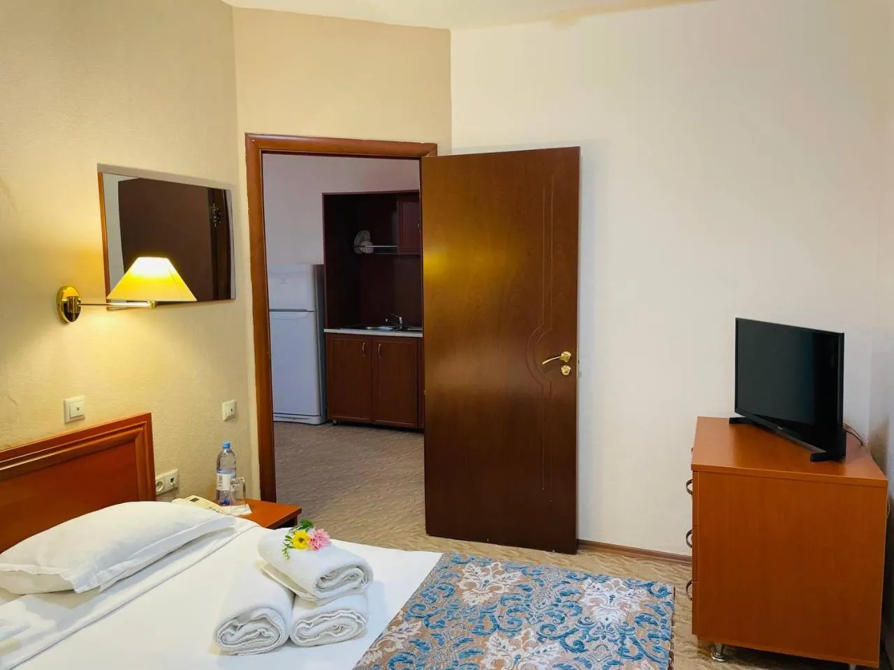 Communal lounge/ TV room, Bed in Tengri Hotel