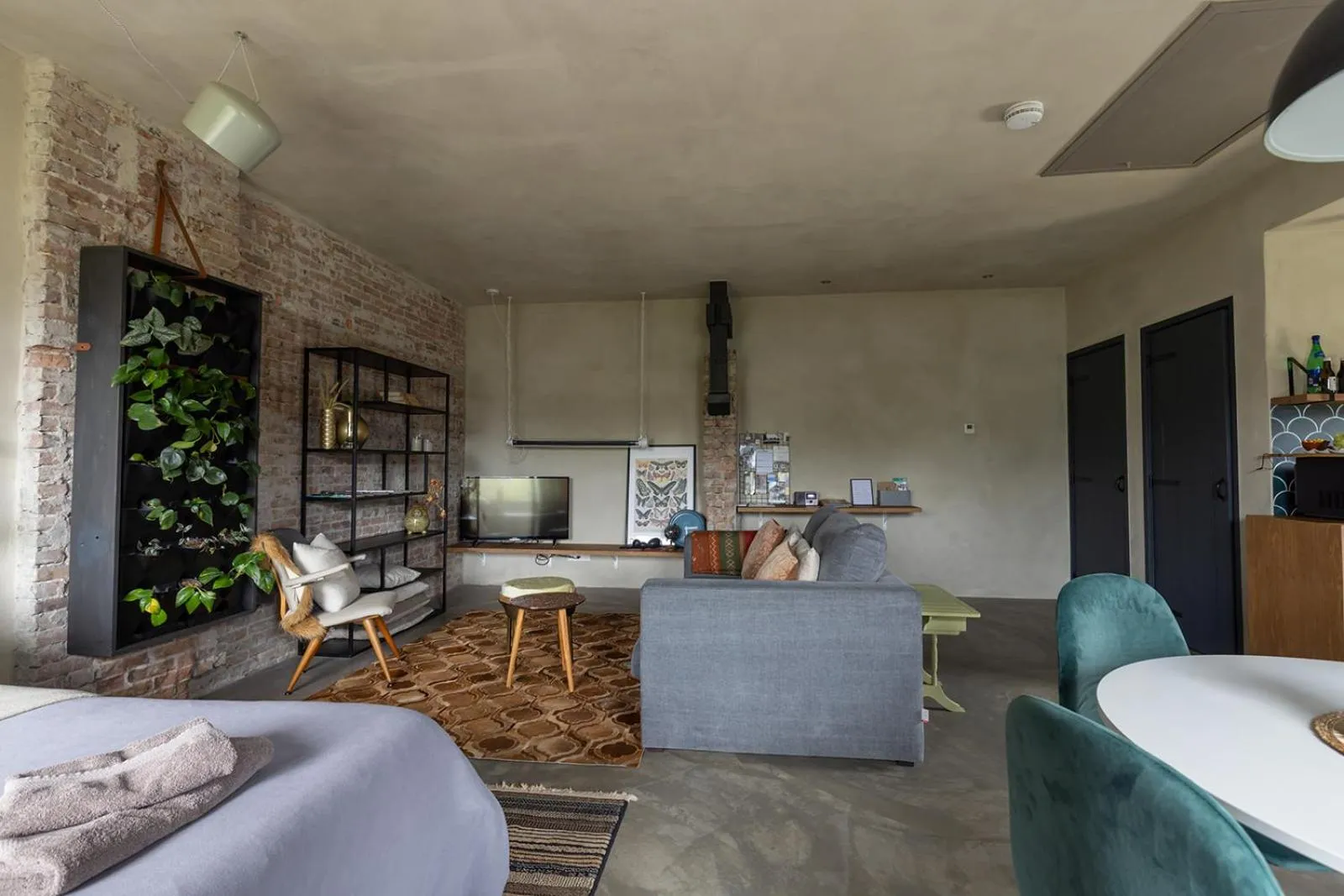 Living room in De oude slaght- luxe suite met buitensauna